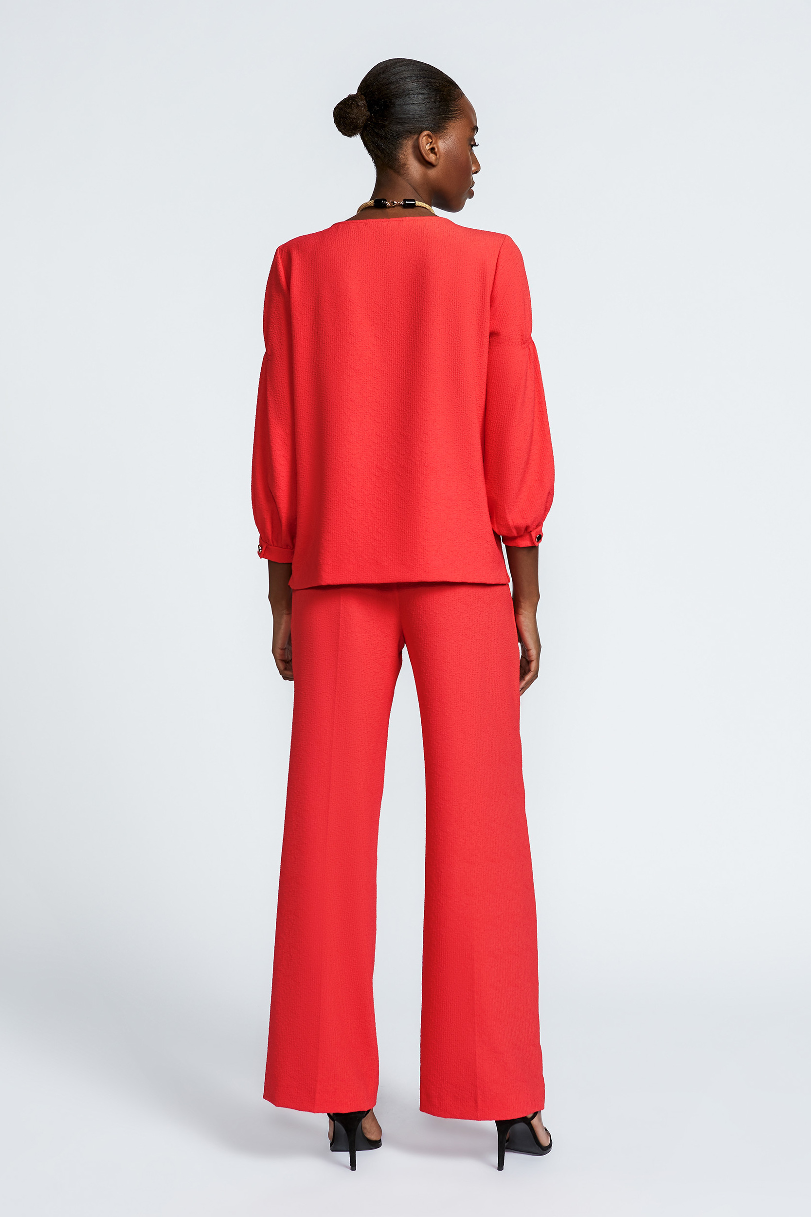 Pleated trousers with straight legs