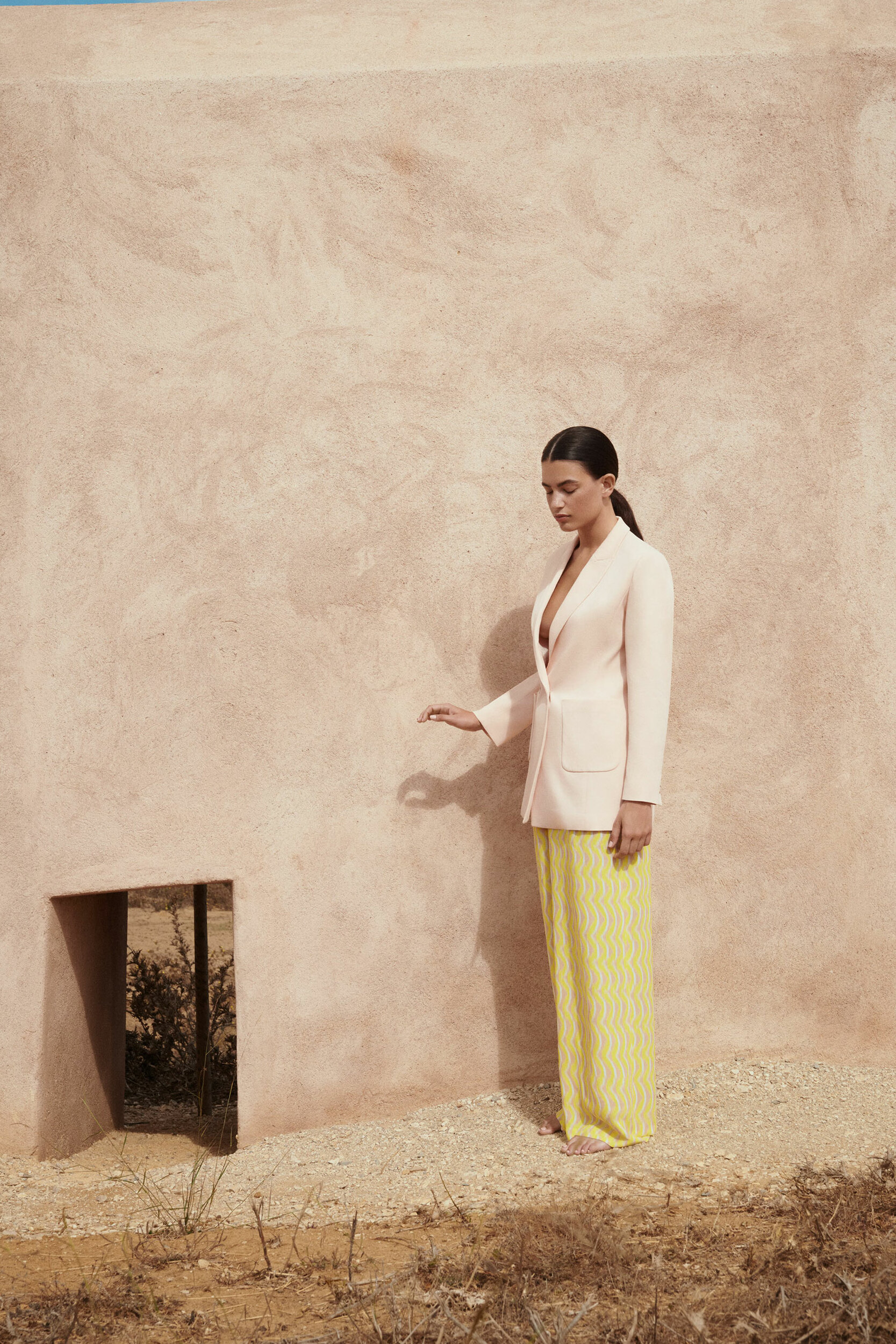 Trousers in crepe fabric