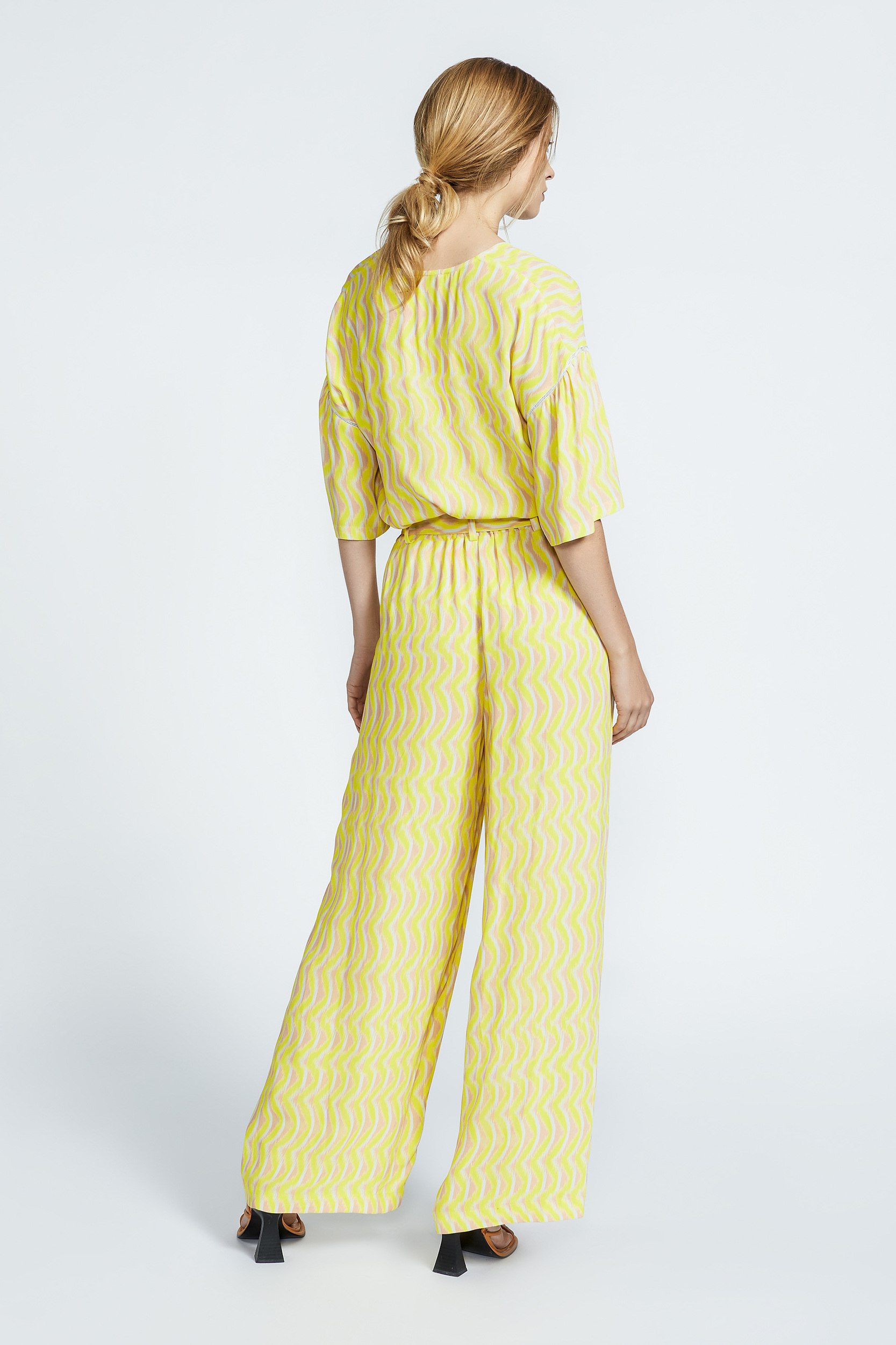 Trousers in crepe fabric