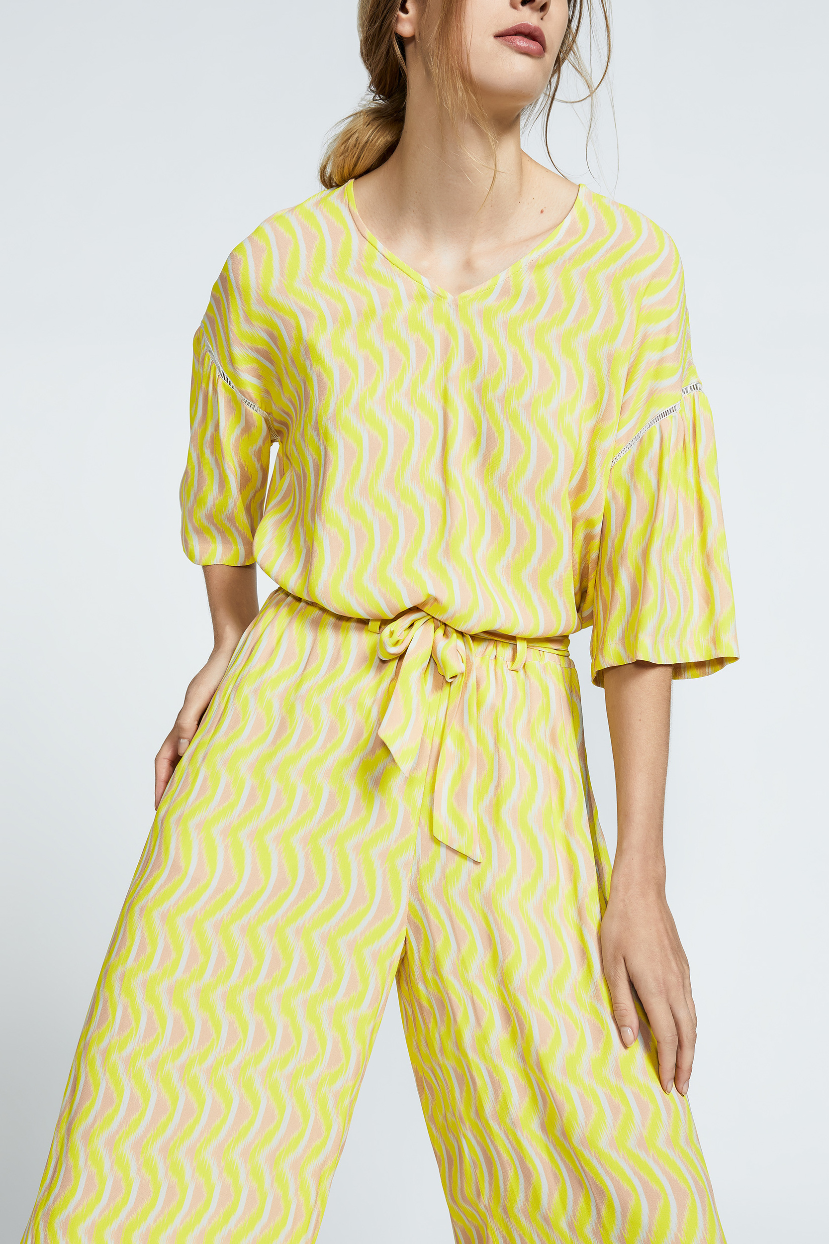 Trousers in crepe fabric
