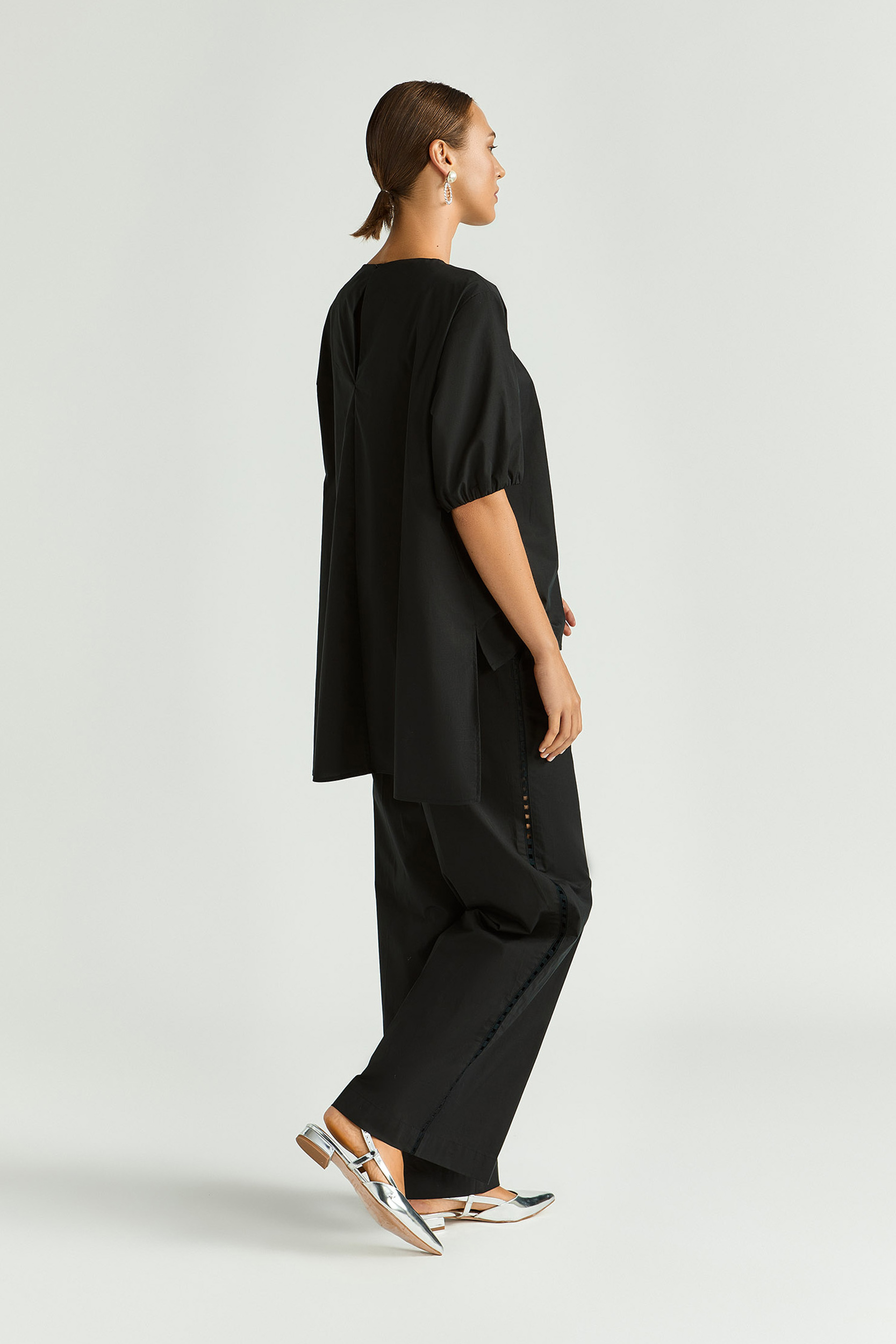 Blouse met asymetrische plooien