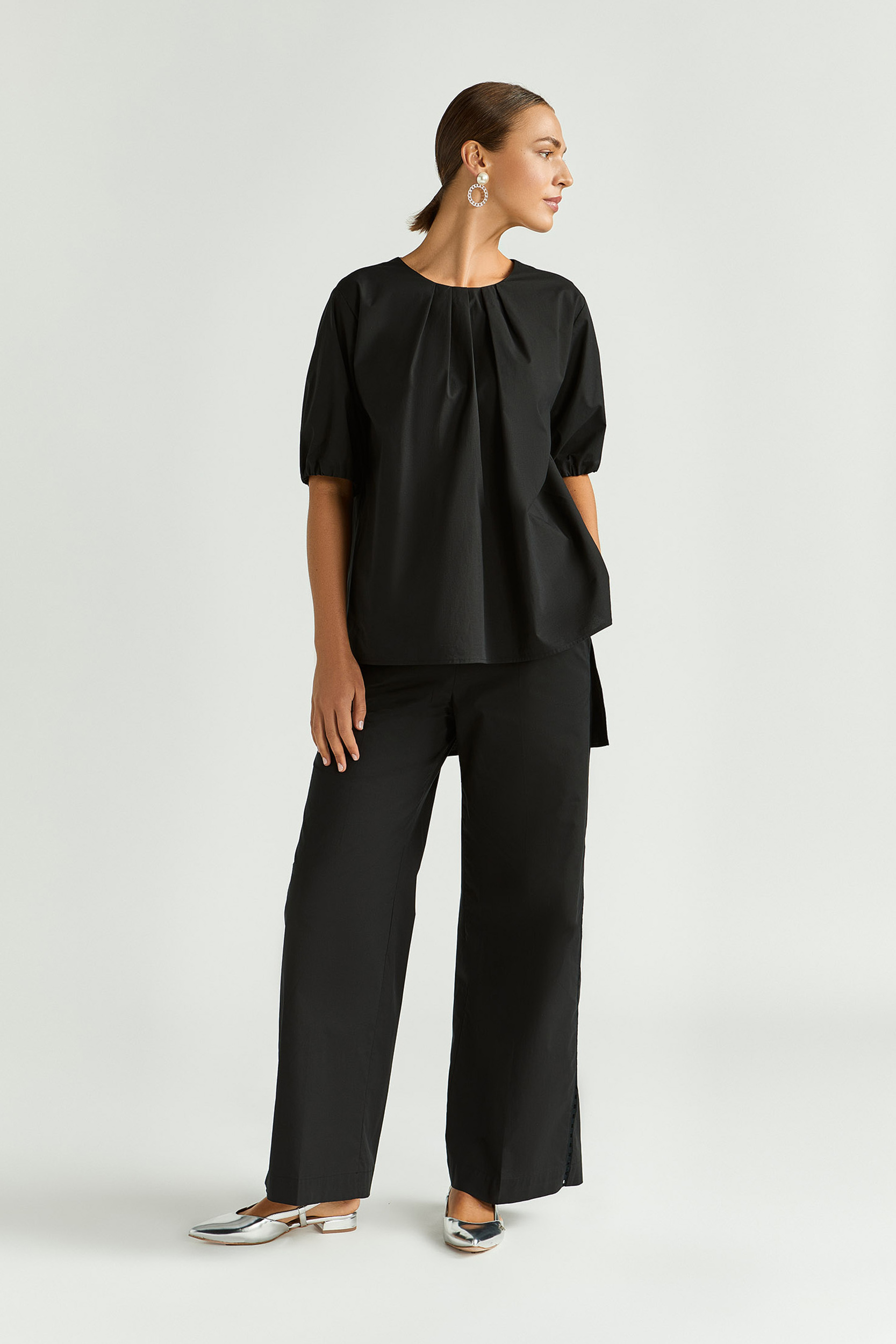 Blouse met asymetrische plooien