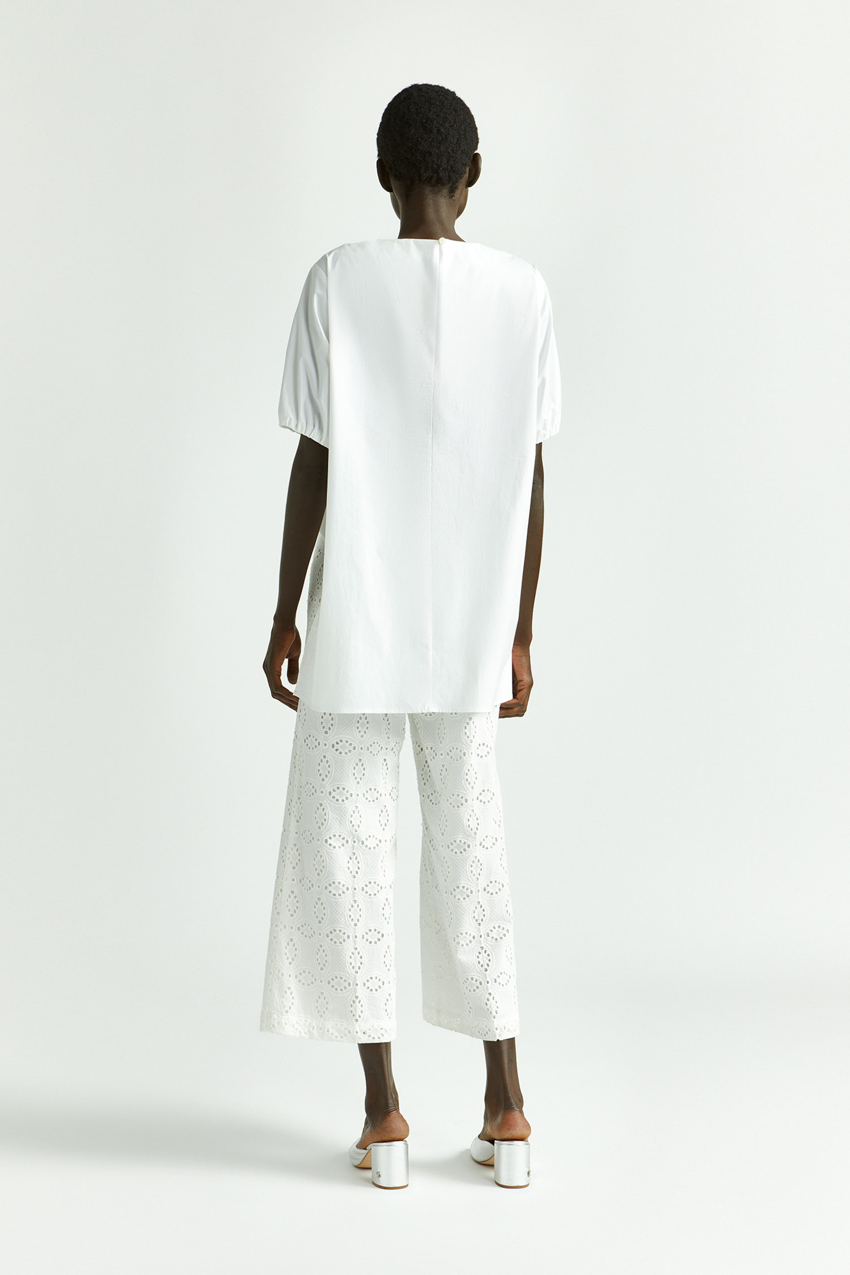 Blouse avec plis asymétriques
