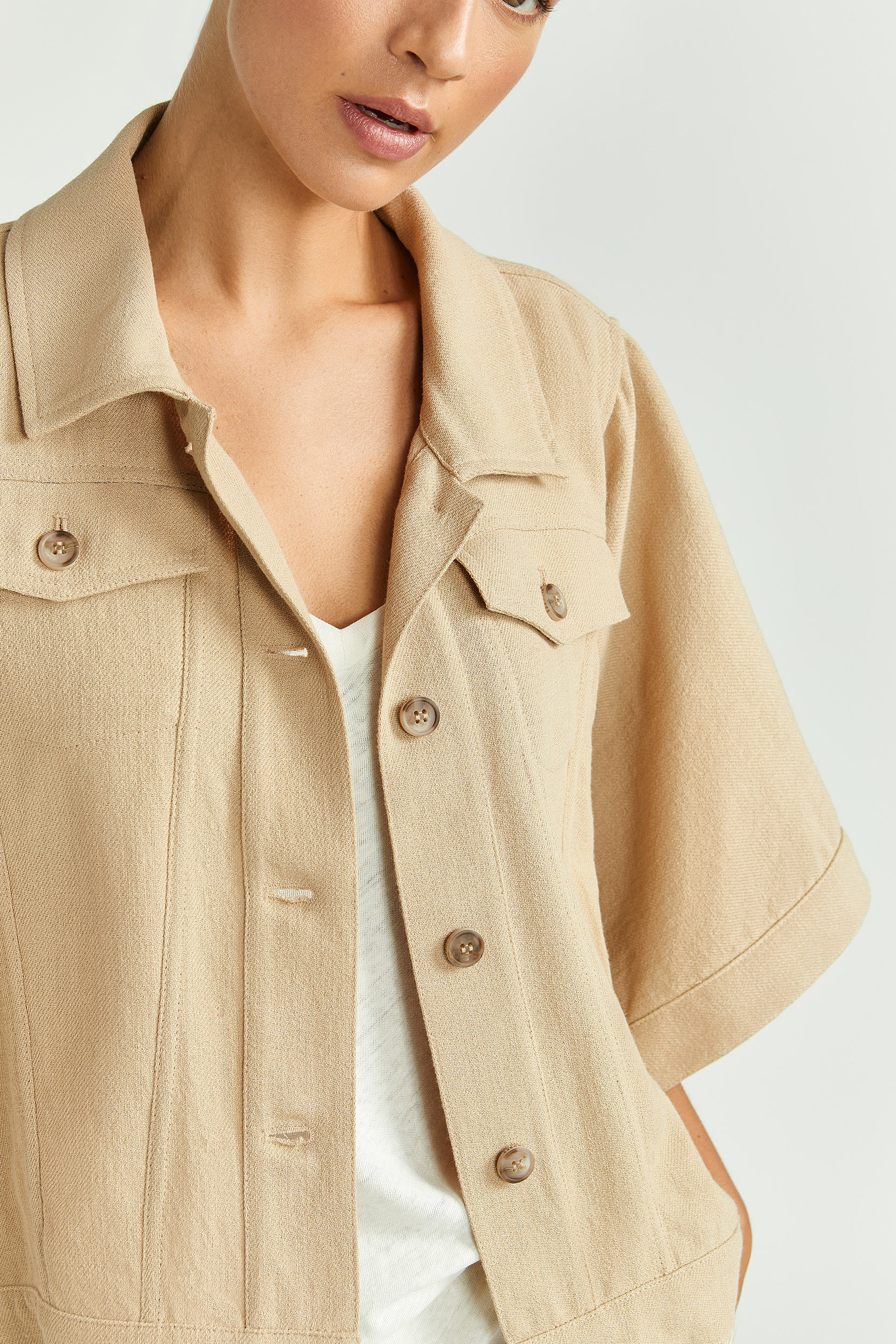 Cape with denim jacket look