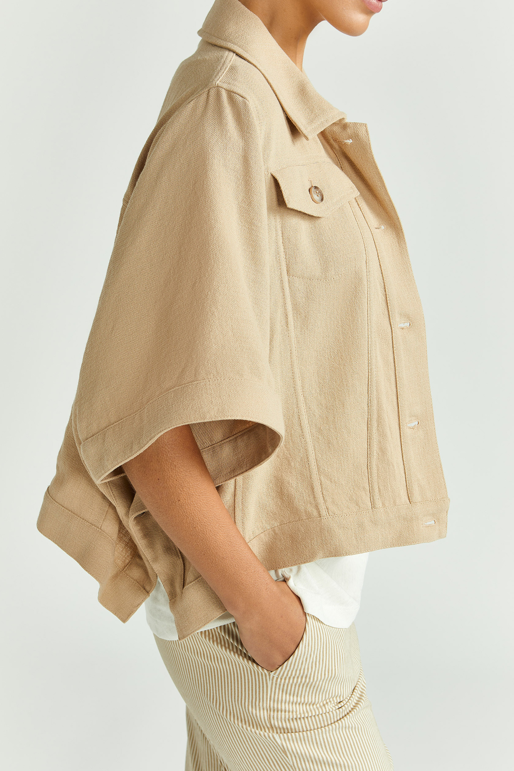 Cape with denim jacket look