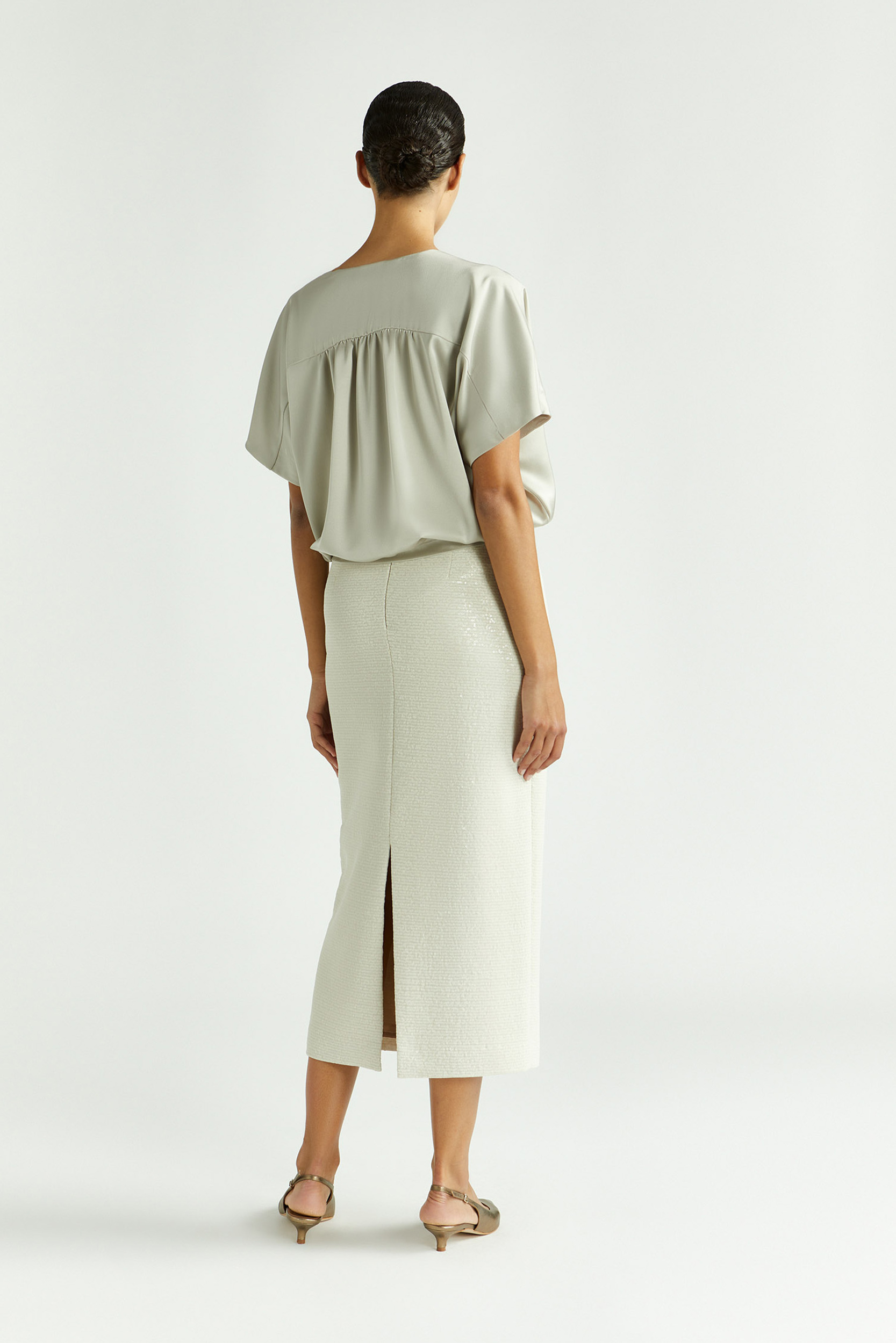 Blouse van glanzende stof