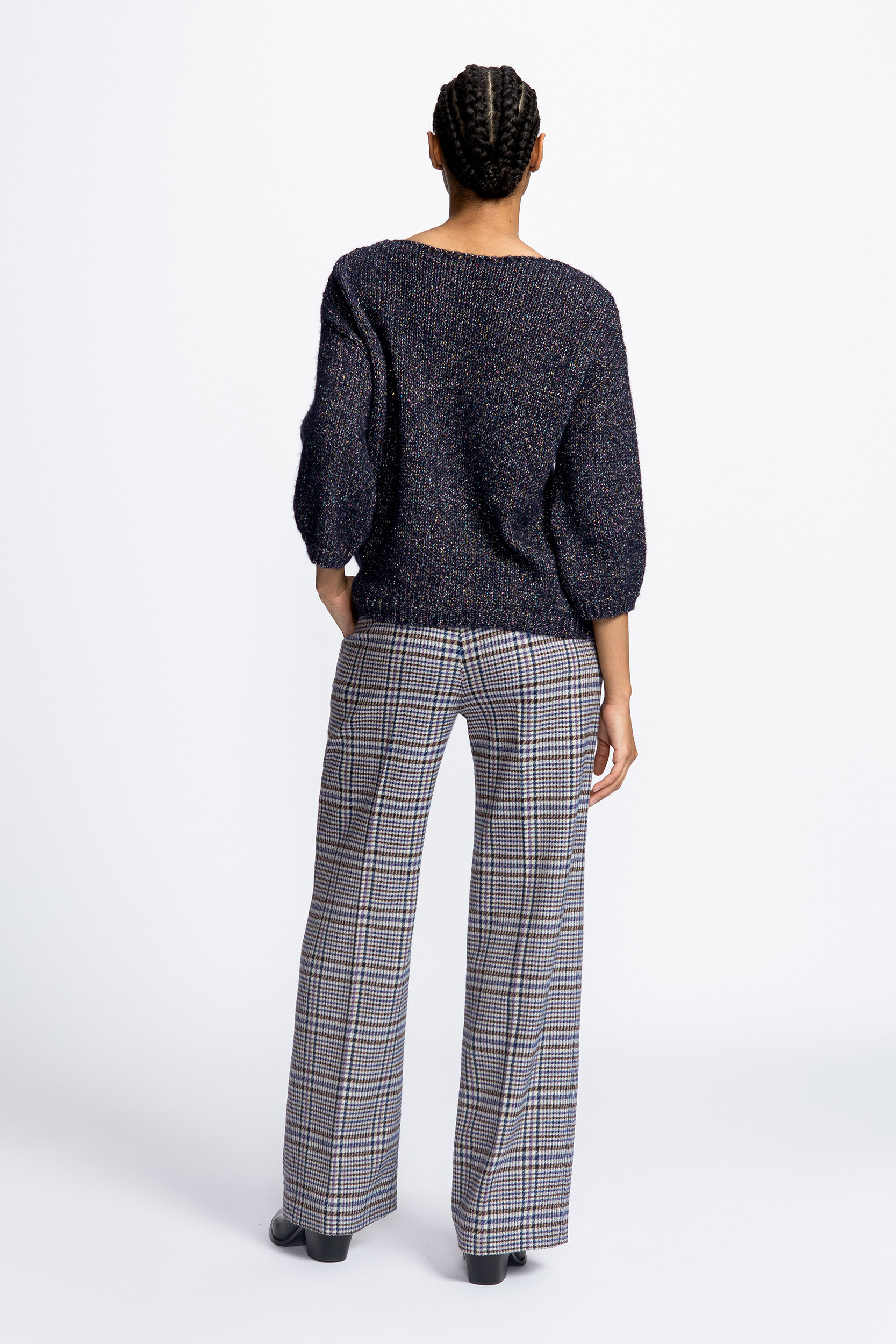 Pull tricoté contenant du lurex