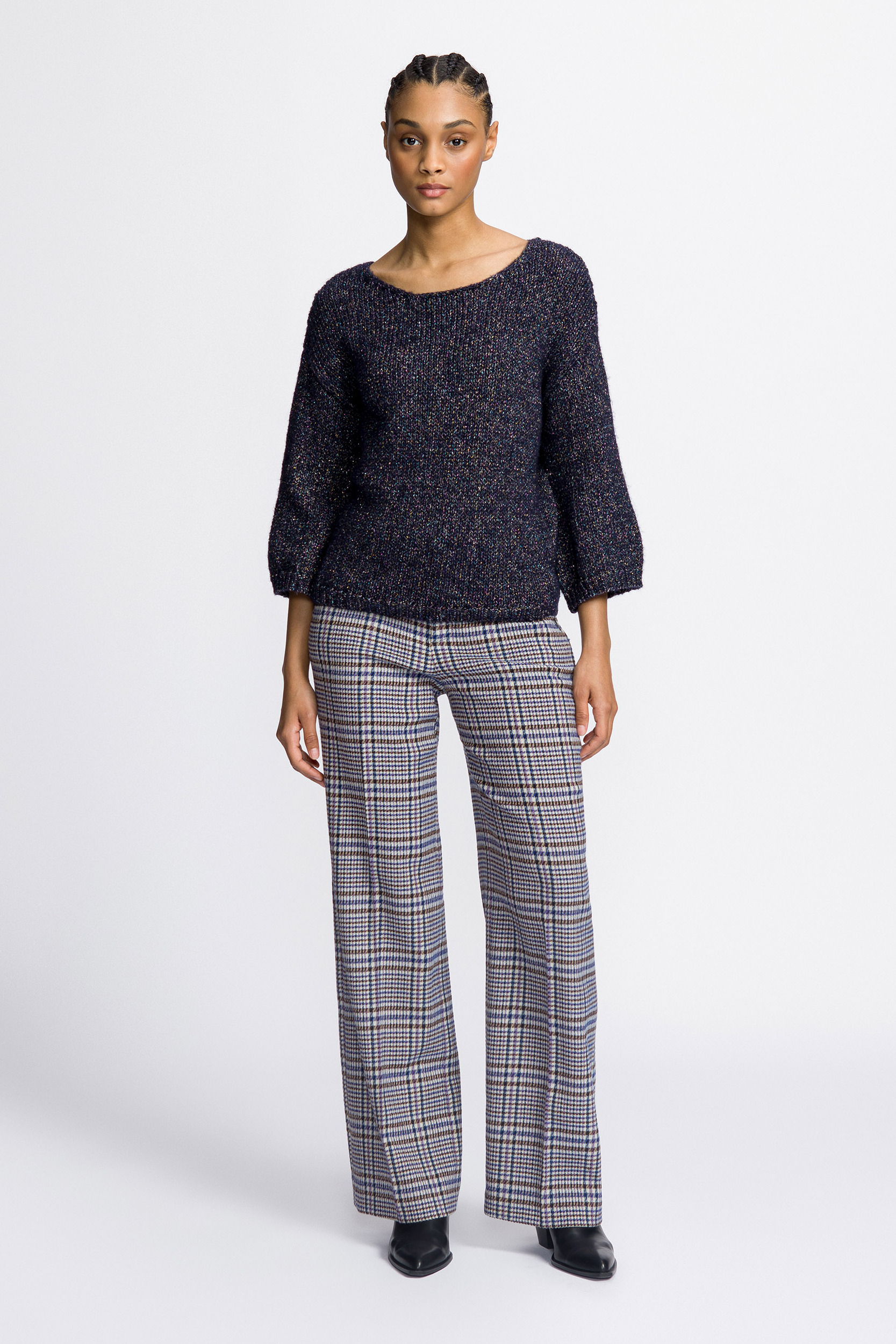 Pull tricoté contenant du lurex