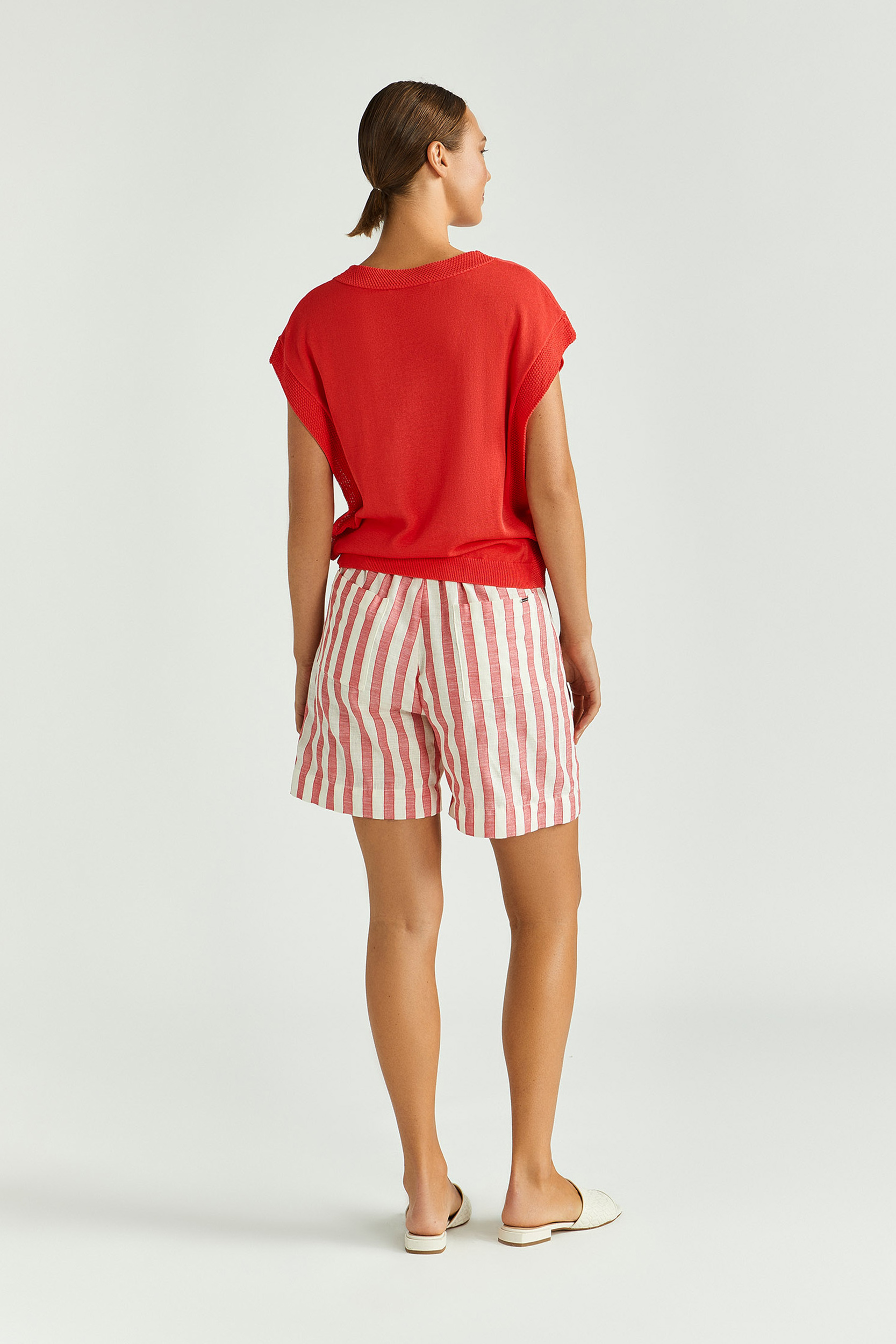 Pull sans manches avec bord fantaisie