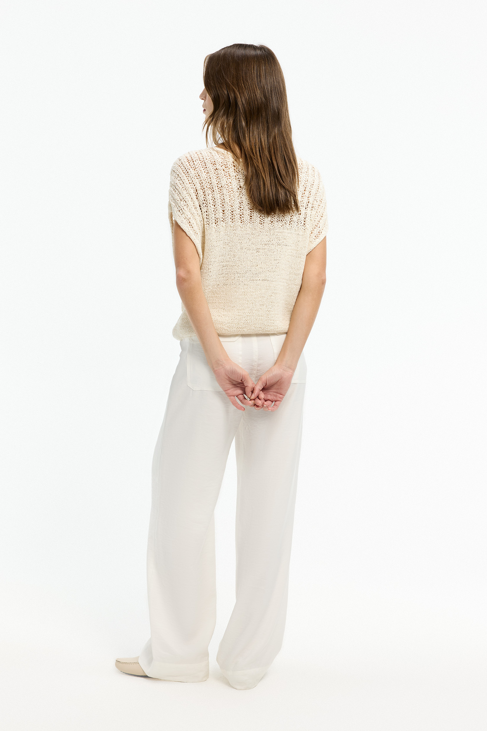 Mouwloze losgebreide pull 