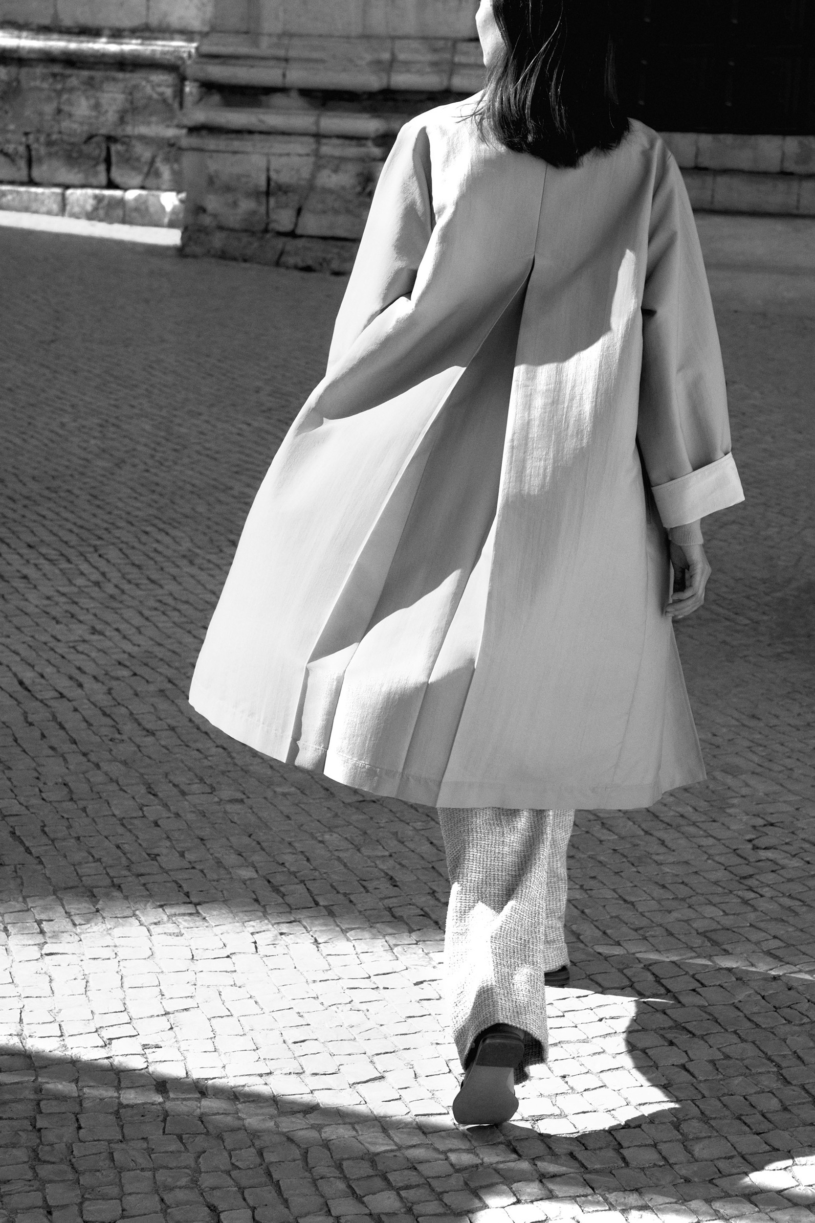 Trench coat with waist belt