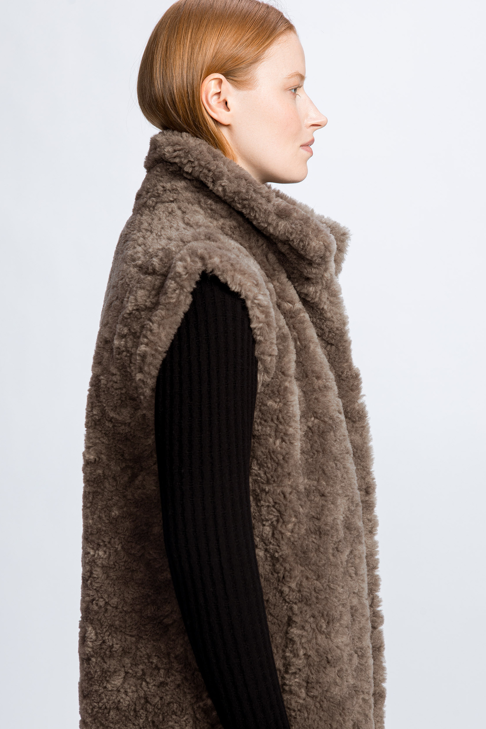 Manteau teddy sans manches