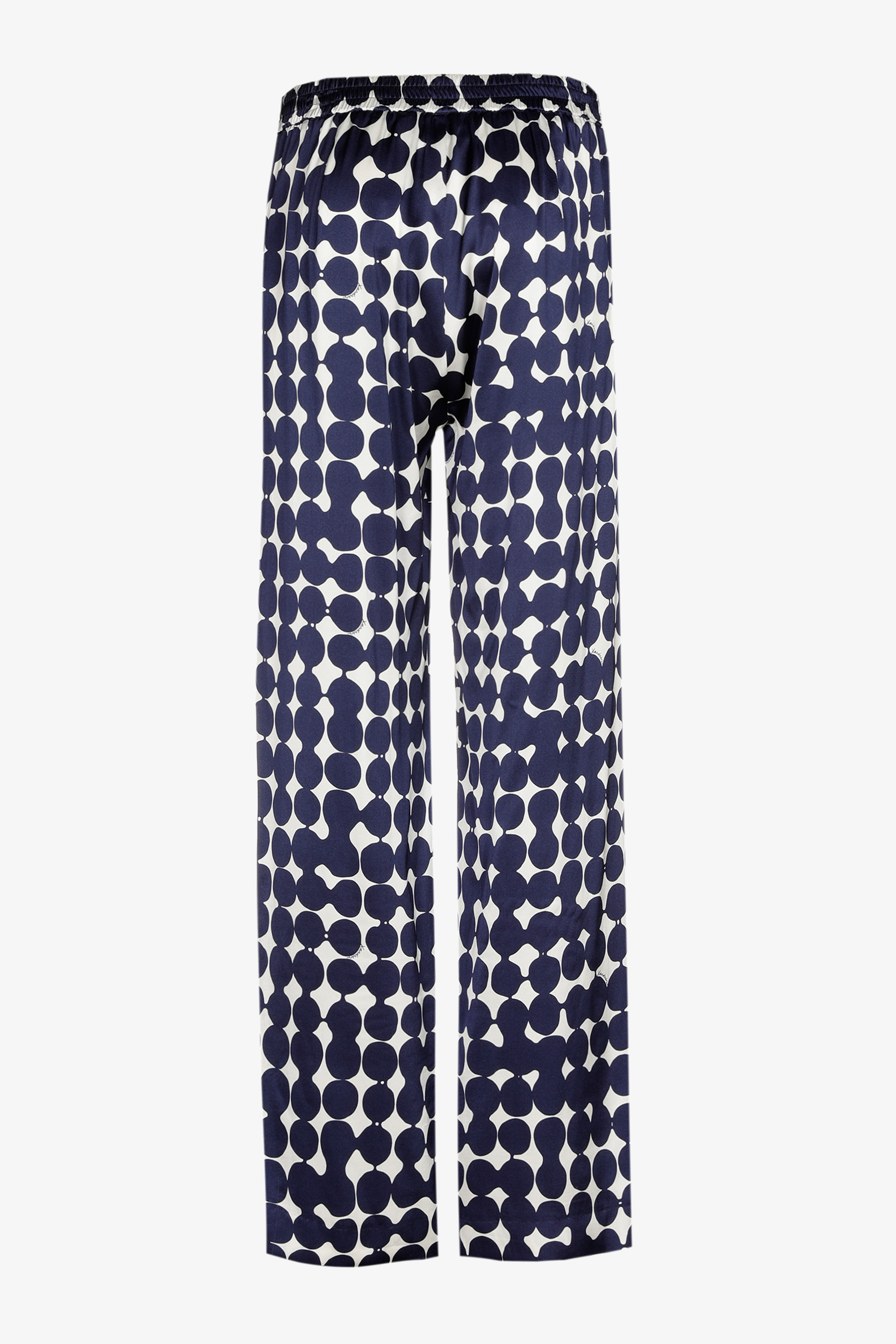 Trousers with in-house dot print