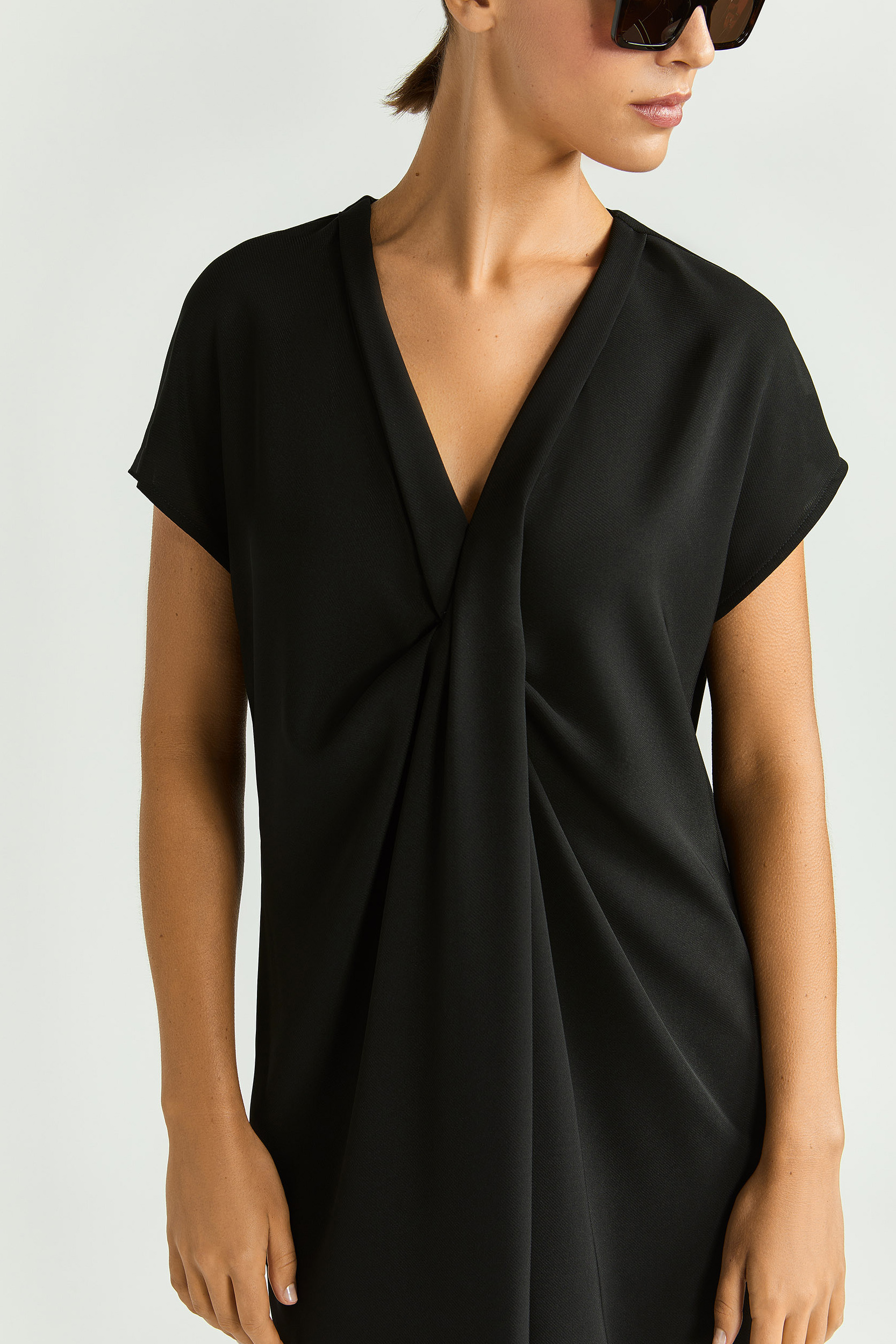 Robe élégante avec détail plissé
