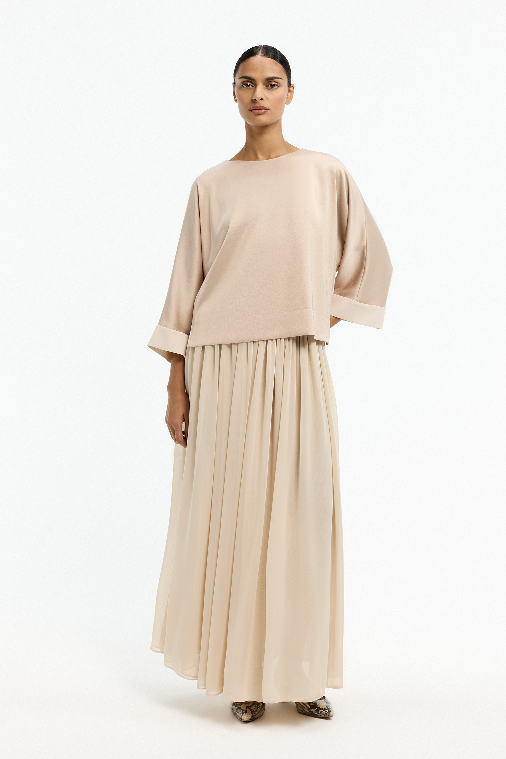 Blouse met parelknopen op de rug