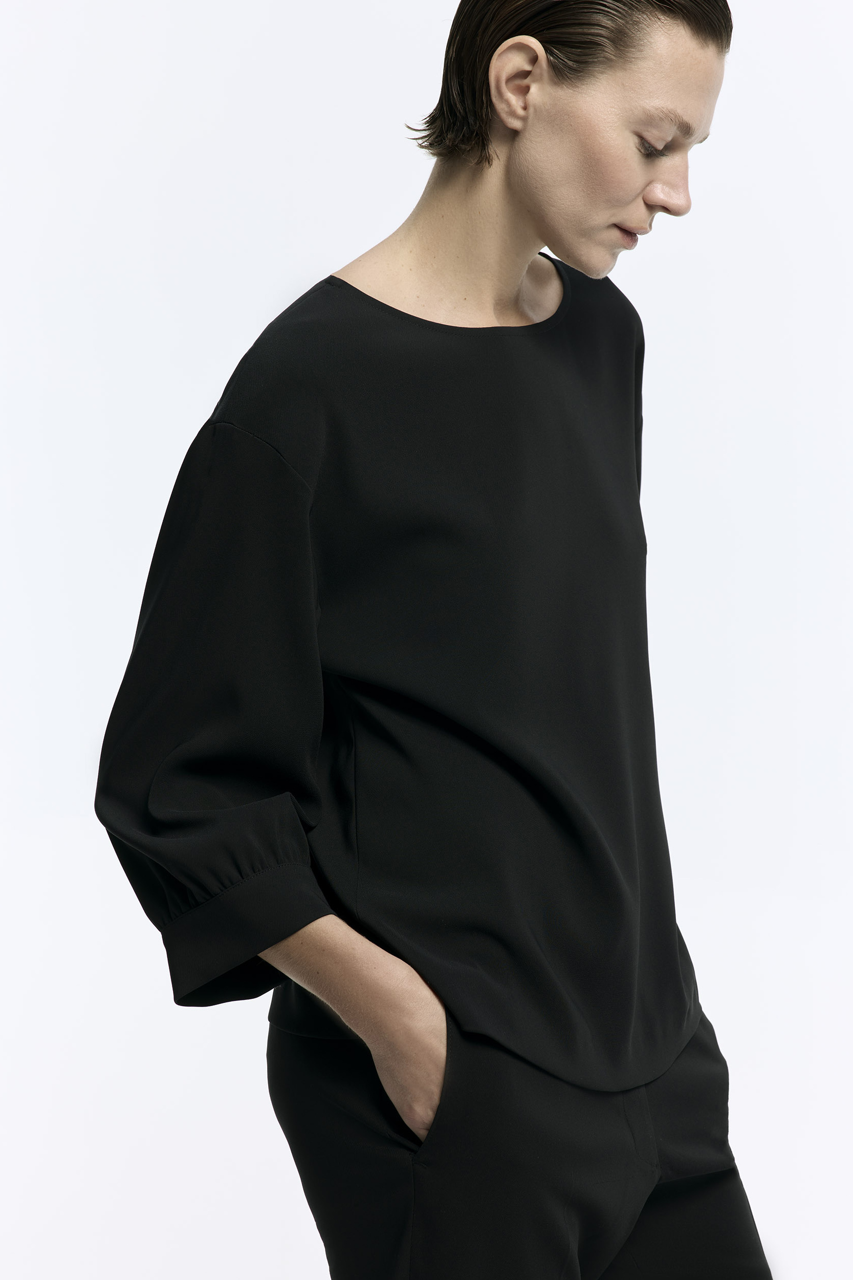 Blouse with loose sleeves