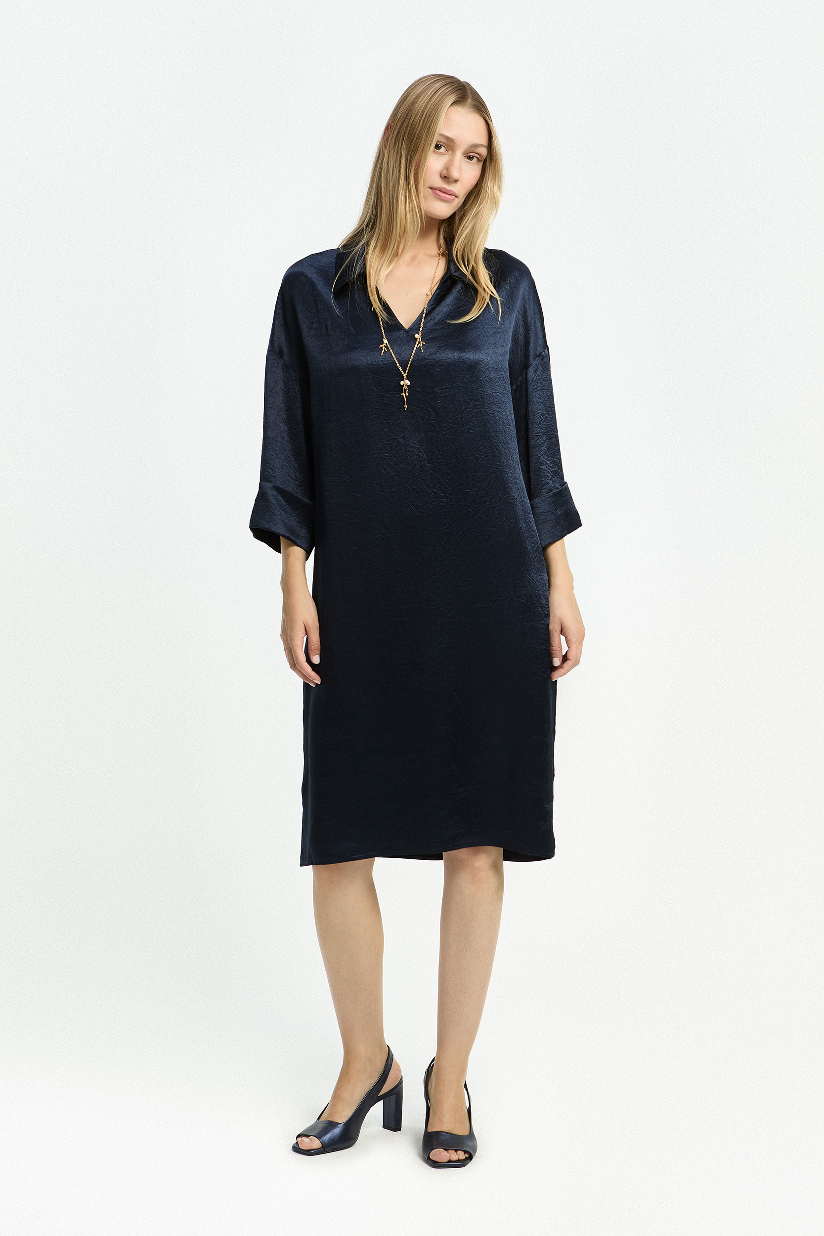Robe polo à plis raffinés