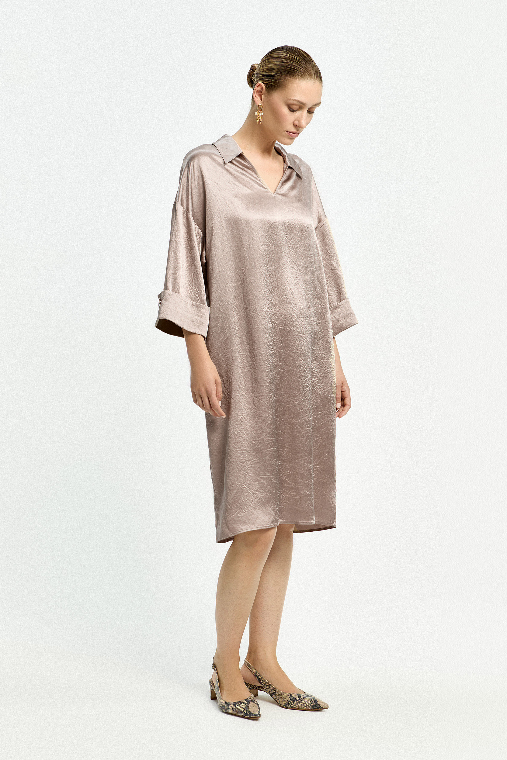 Polo dress with sophisticated pleats