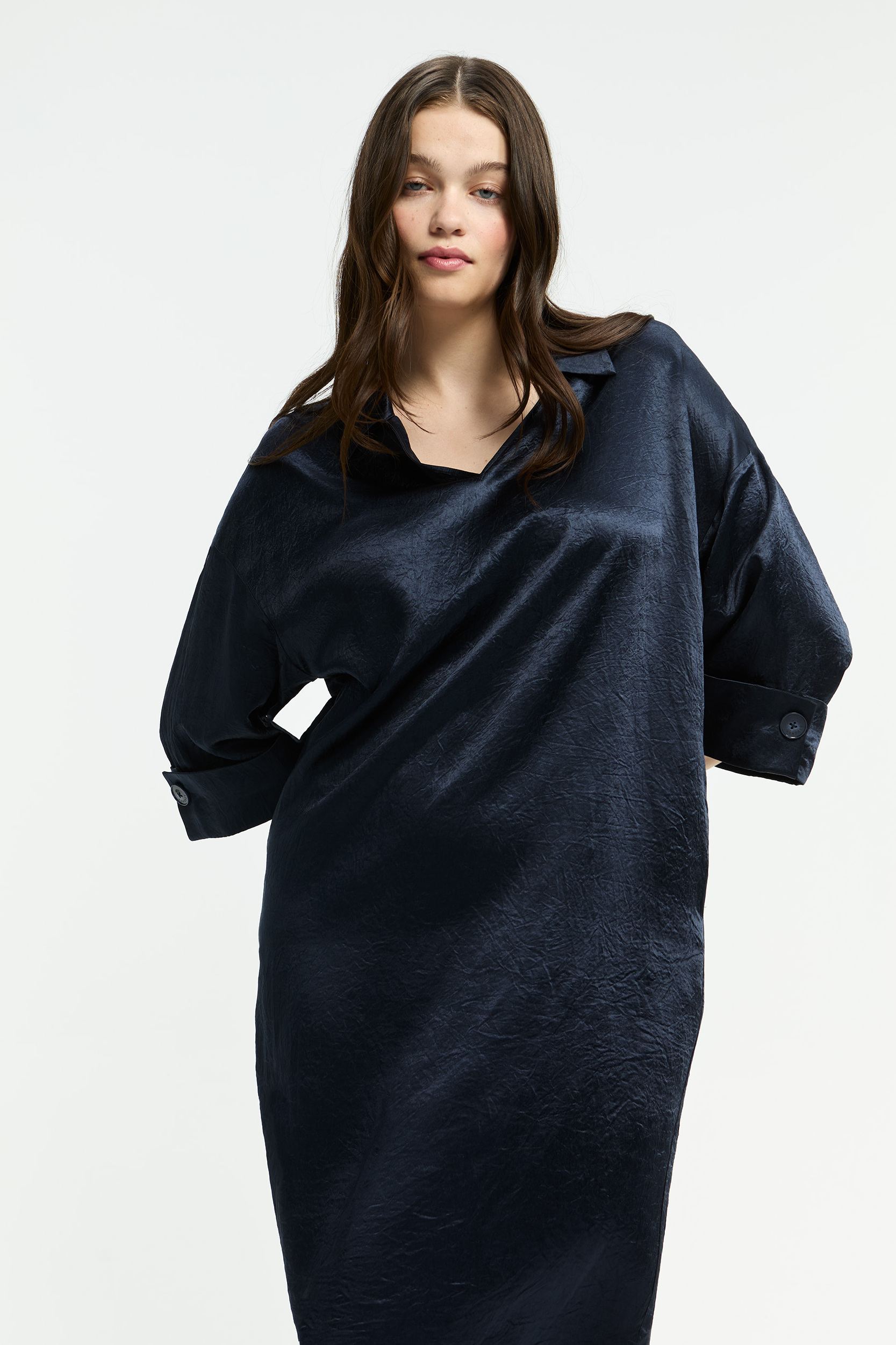Robe polo à plis raffinés
