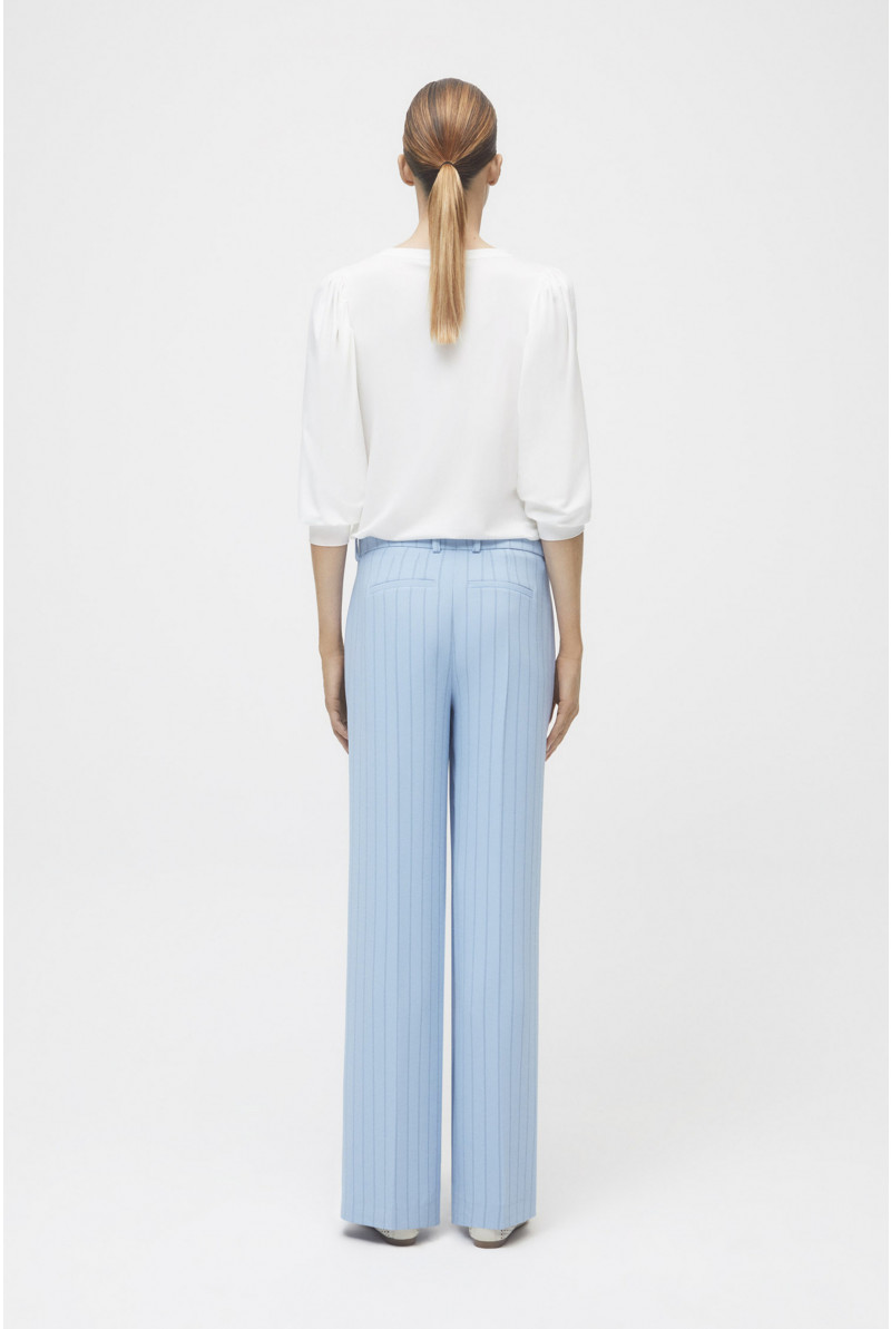 Wide light blue striped trousers