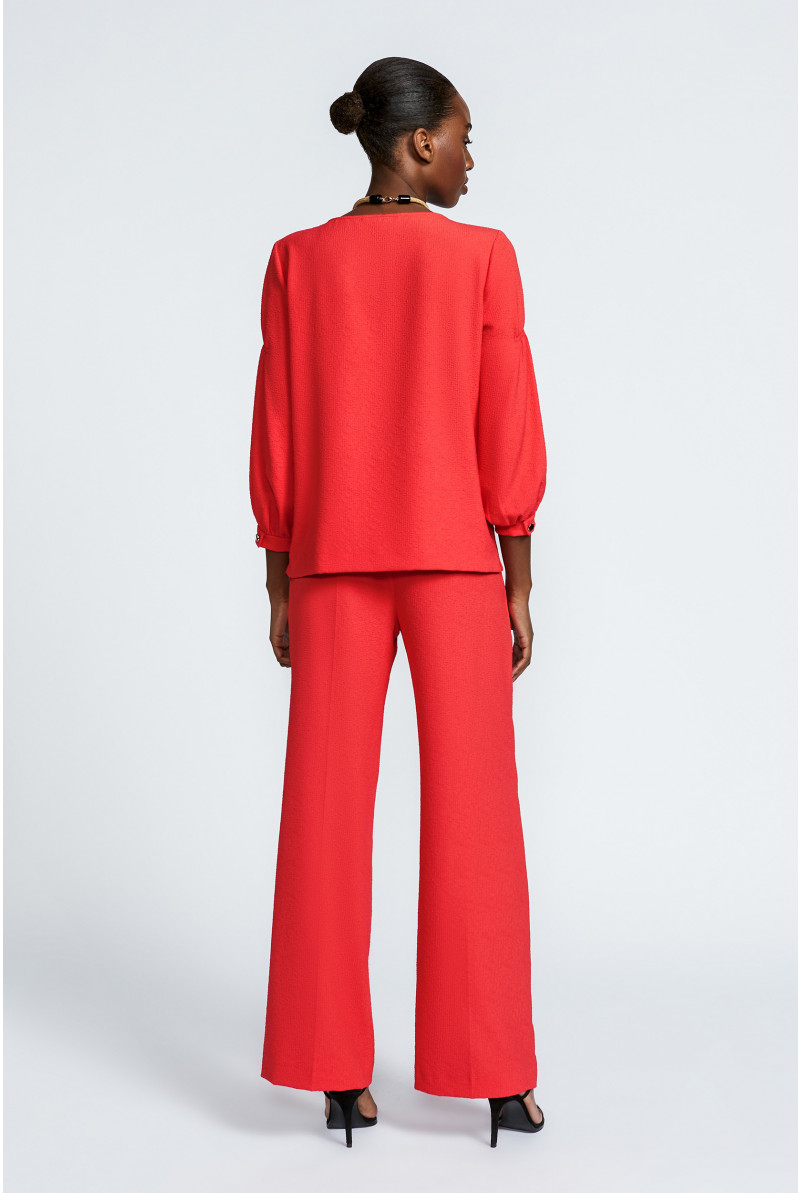 Pleated trousers with straight legs
