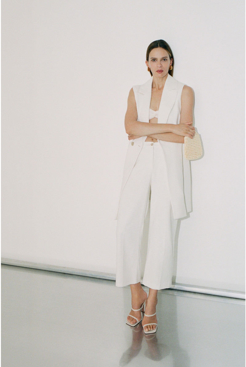 Veste sans manches avec double rangée de boutons
