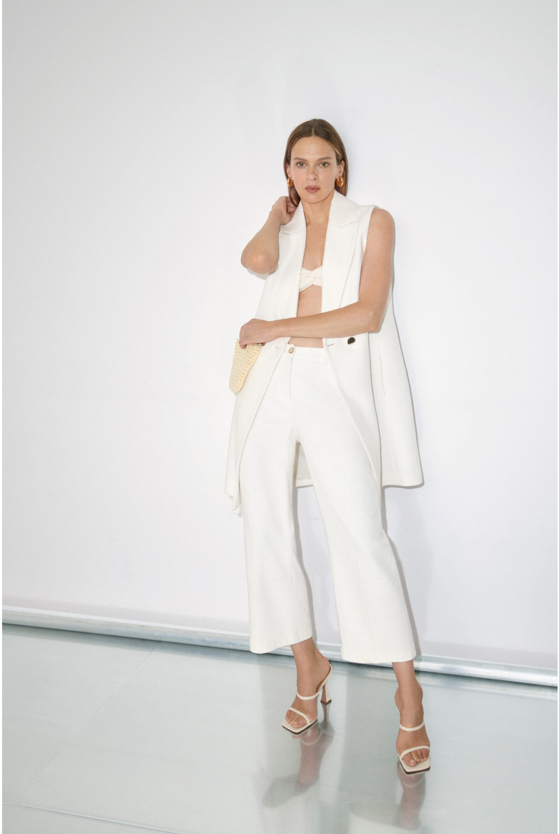 Veste sans manches avec double rangée de boutons