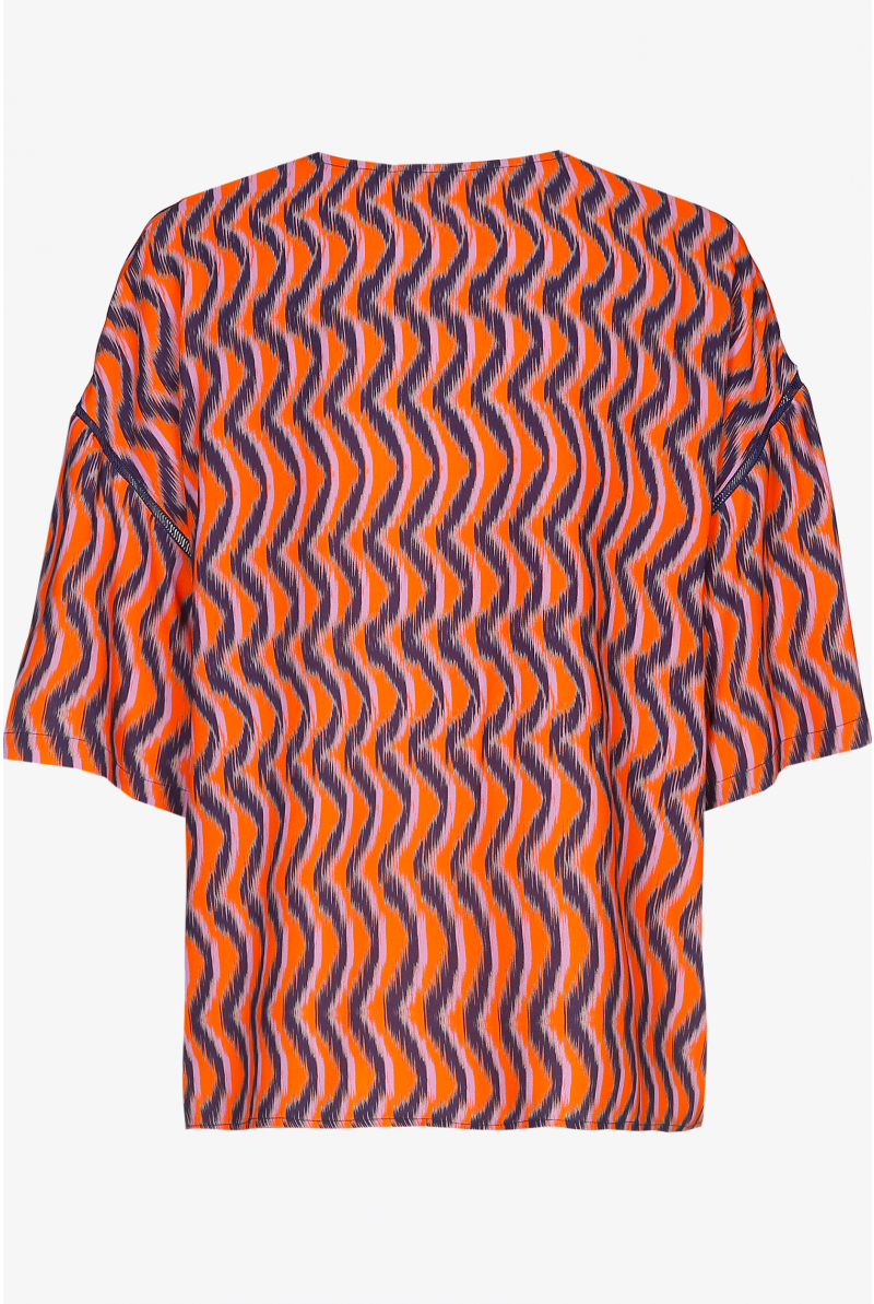 Blouse in  crêpe stof