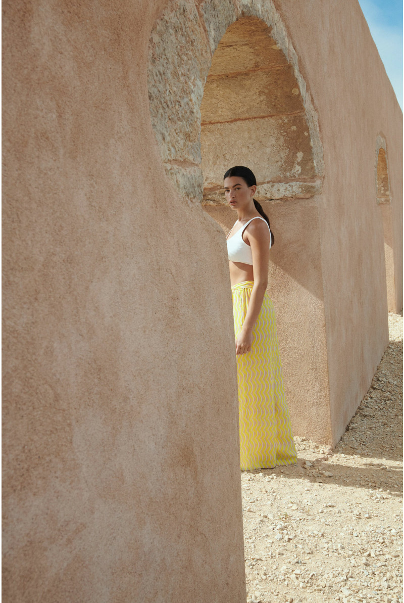 Trousers in crepe fabric