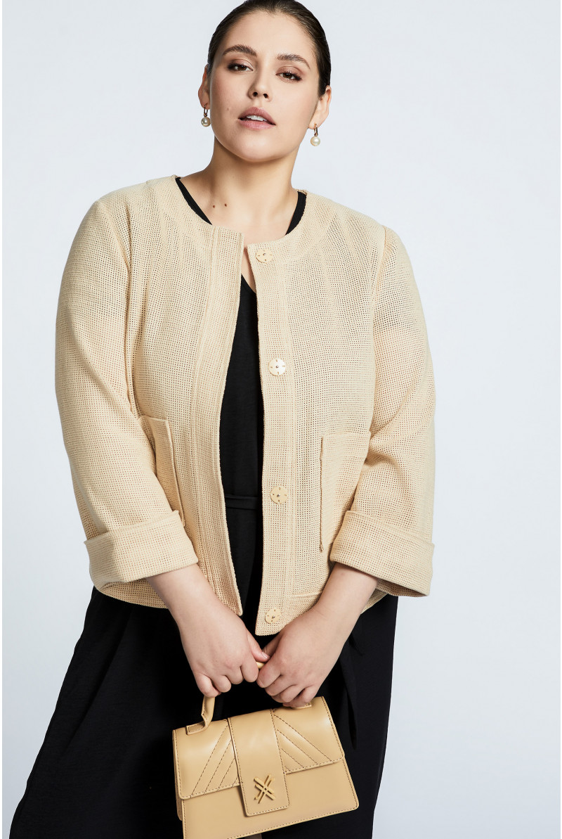Short jacket in raffia