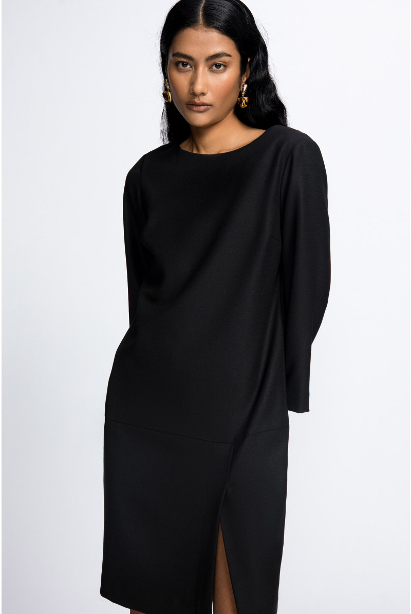 Asymmetrical dress with slit
