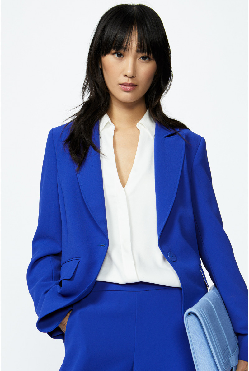 Blazer with subtly rounded hem