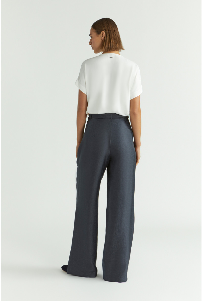 Pantalon brillant à pli marqué