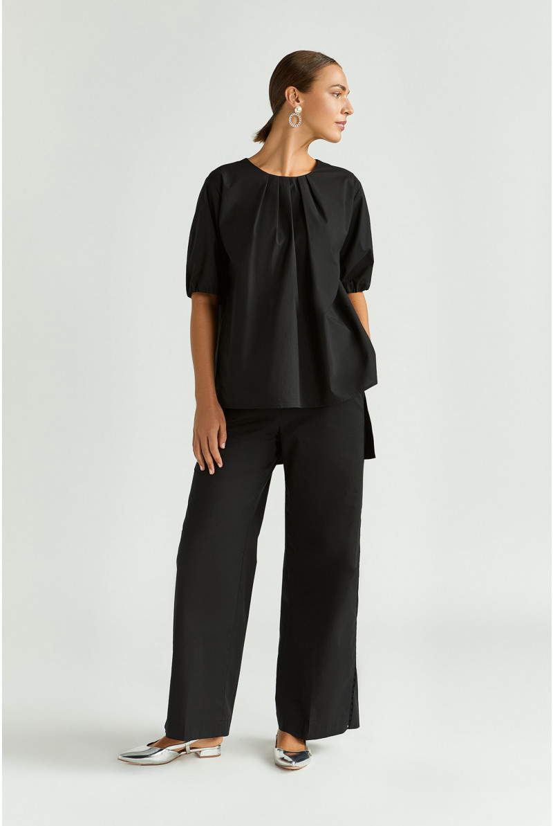Blouse met asymetrische plooien