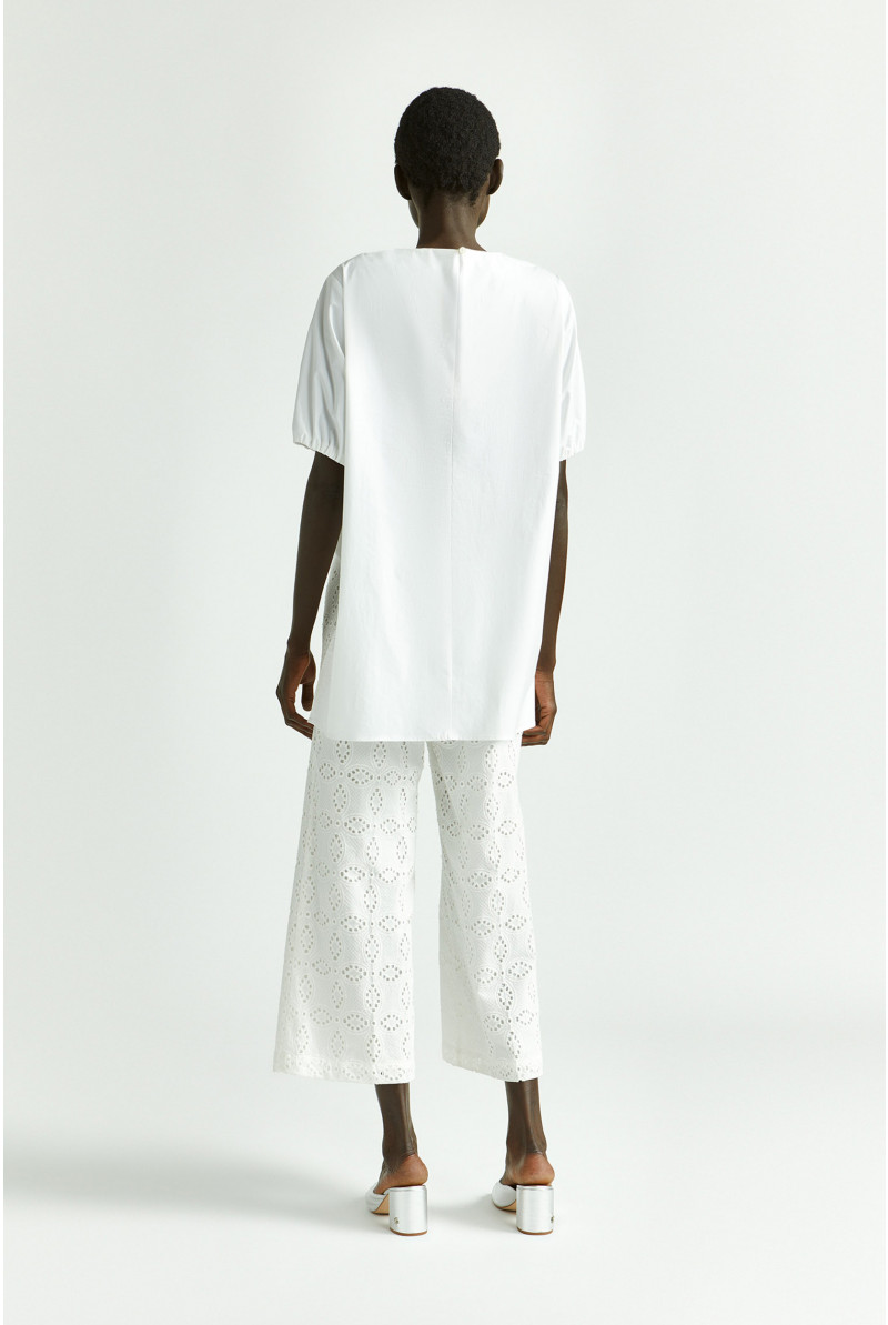 Blouse avec plis asymétriques