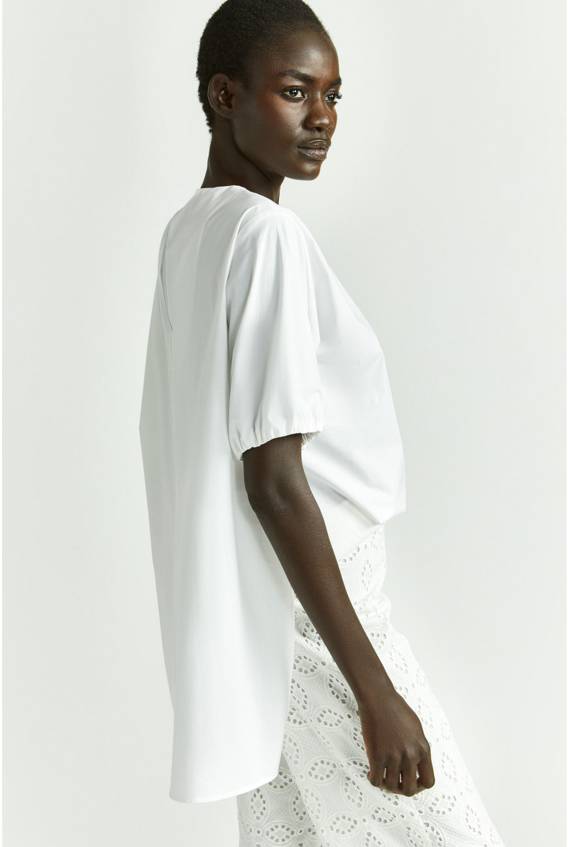 Blouse avec plis asymétriques