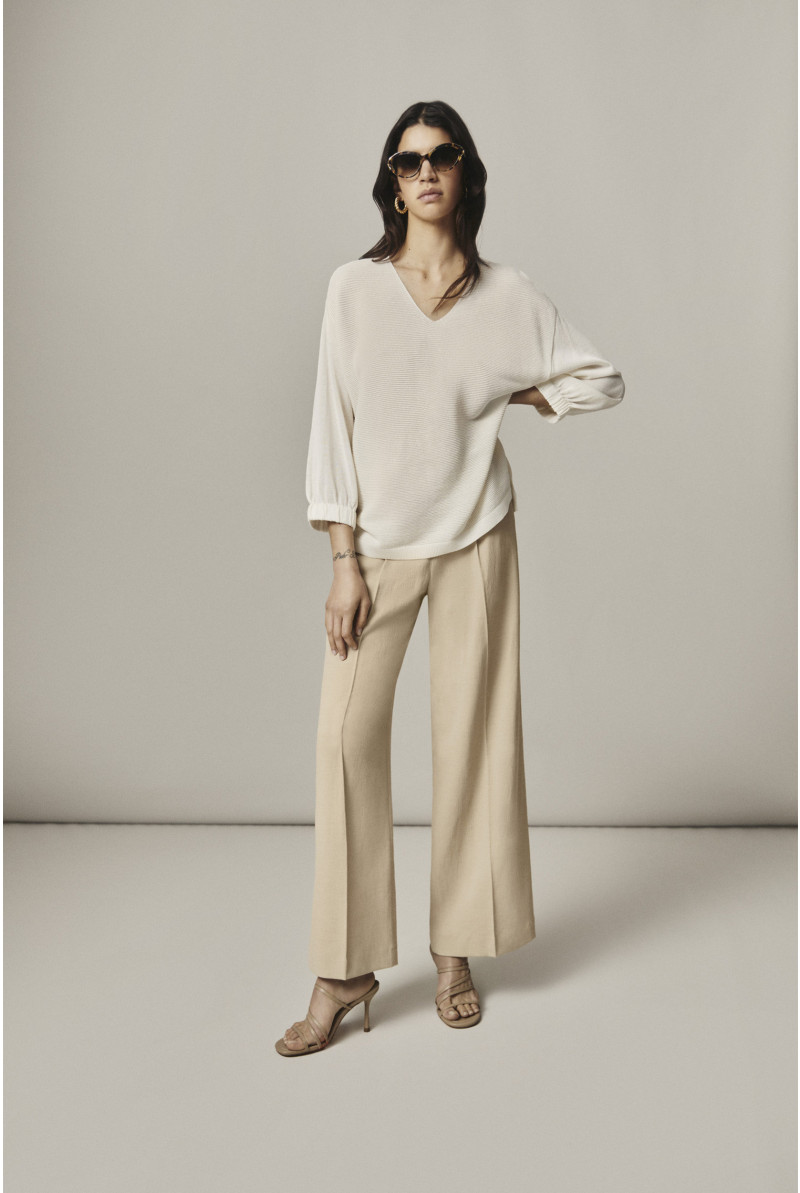 Pull blanc à manches bouffantes
