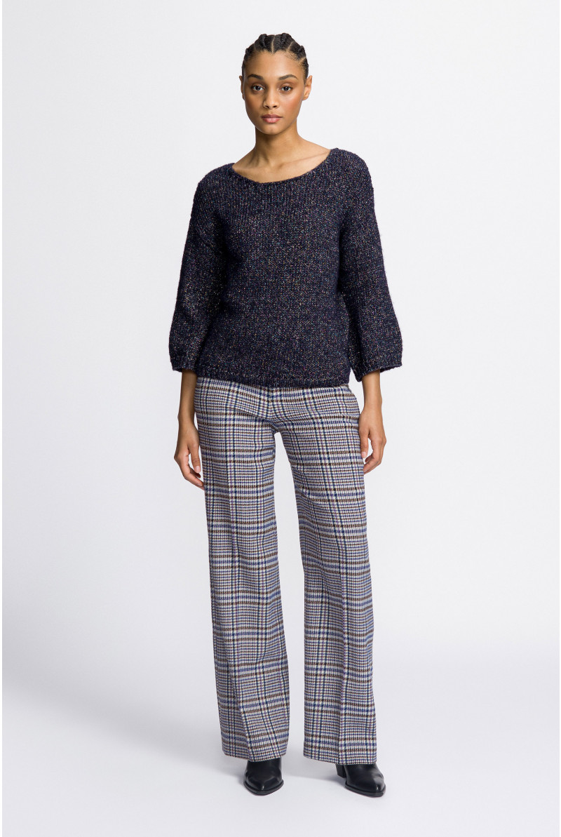 Pull tricoté contenant du lurex