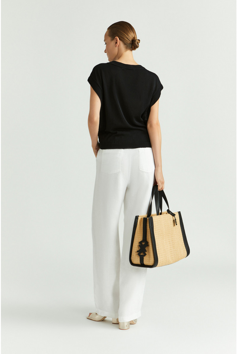 Sleeveless jumper with decorative hem