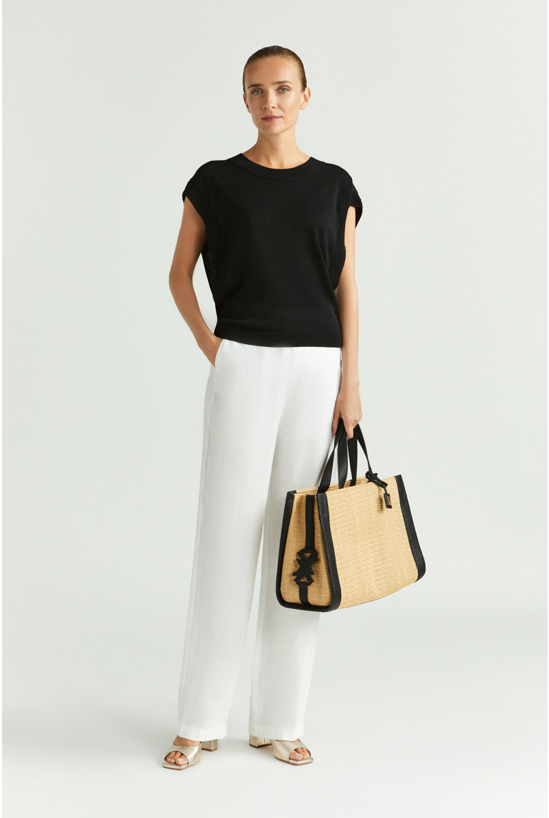 Sleeveless jumper with decorative hem