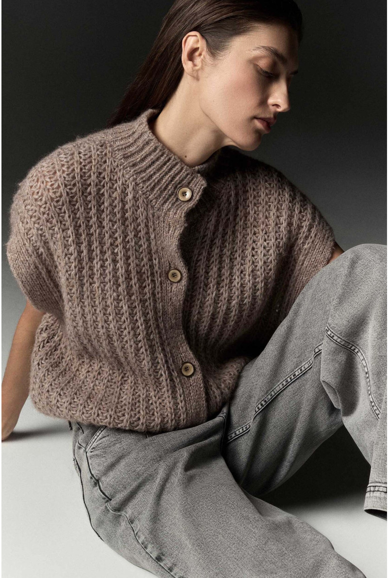 Gebreid vest met knopen