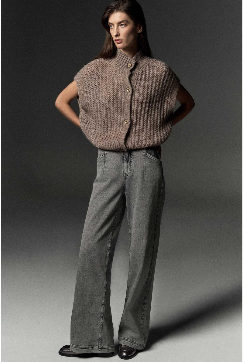 Gebreid vest met knopen