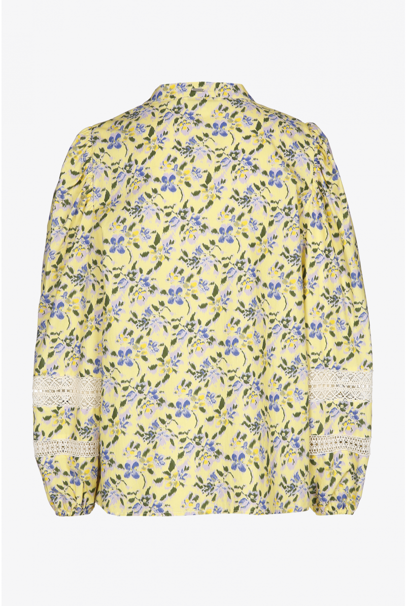 Pastel yellow blouse with blue floral print