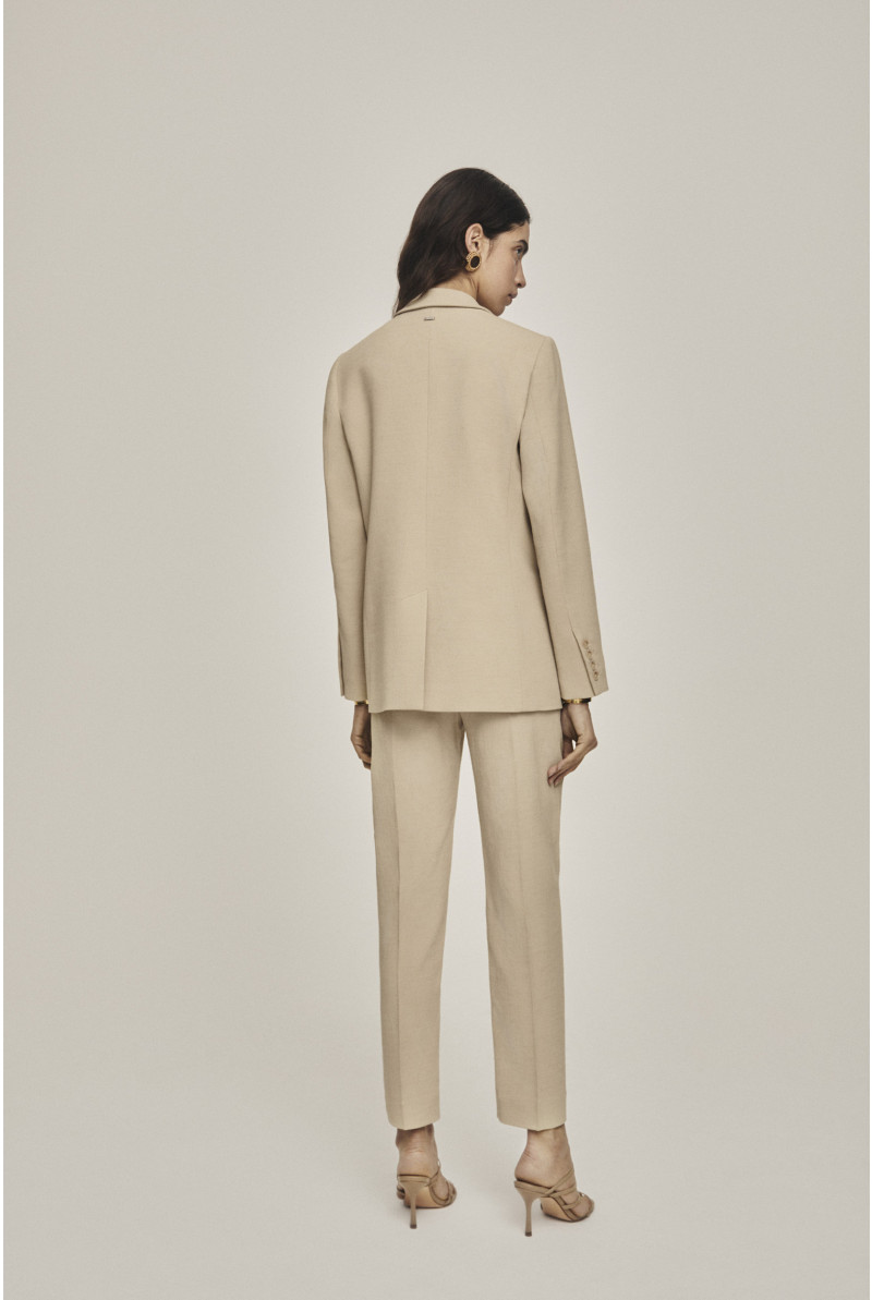 Pantalon beige à pli marqué