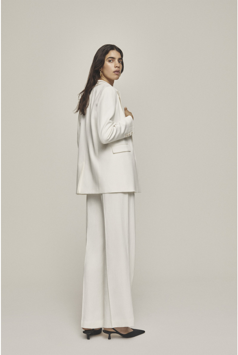 White trousers with wide legs