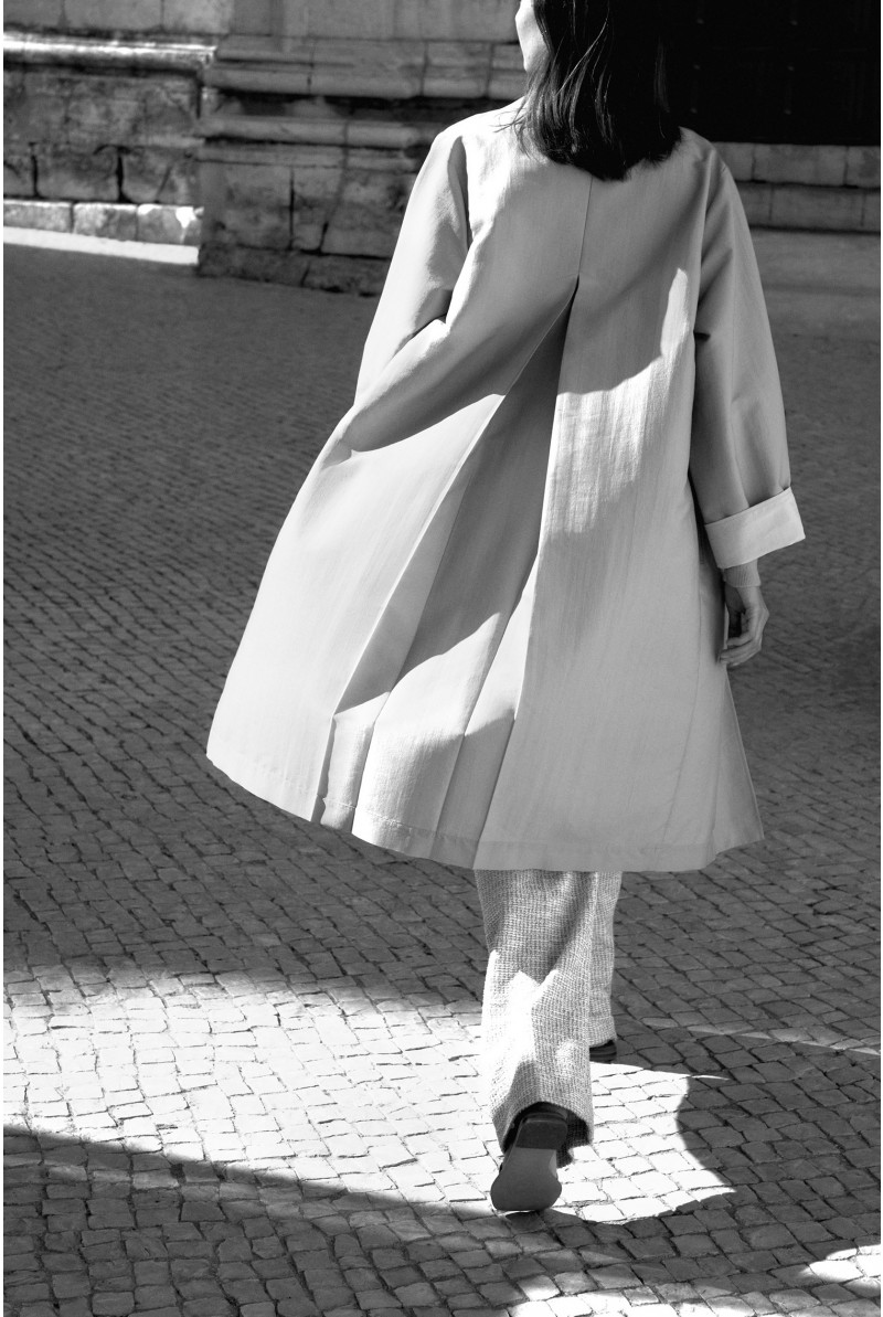 Trench coat with waist belt