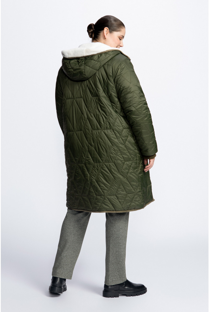 Veste réversible contenant de la fausse fourrure