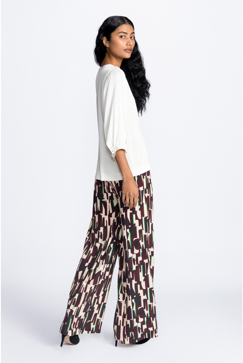 Blouse souple à manches bouffantes