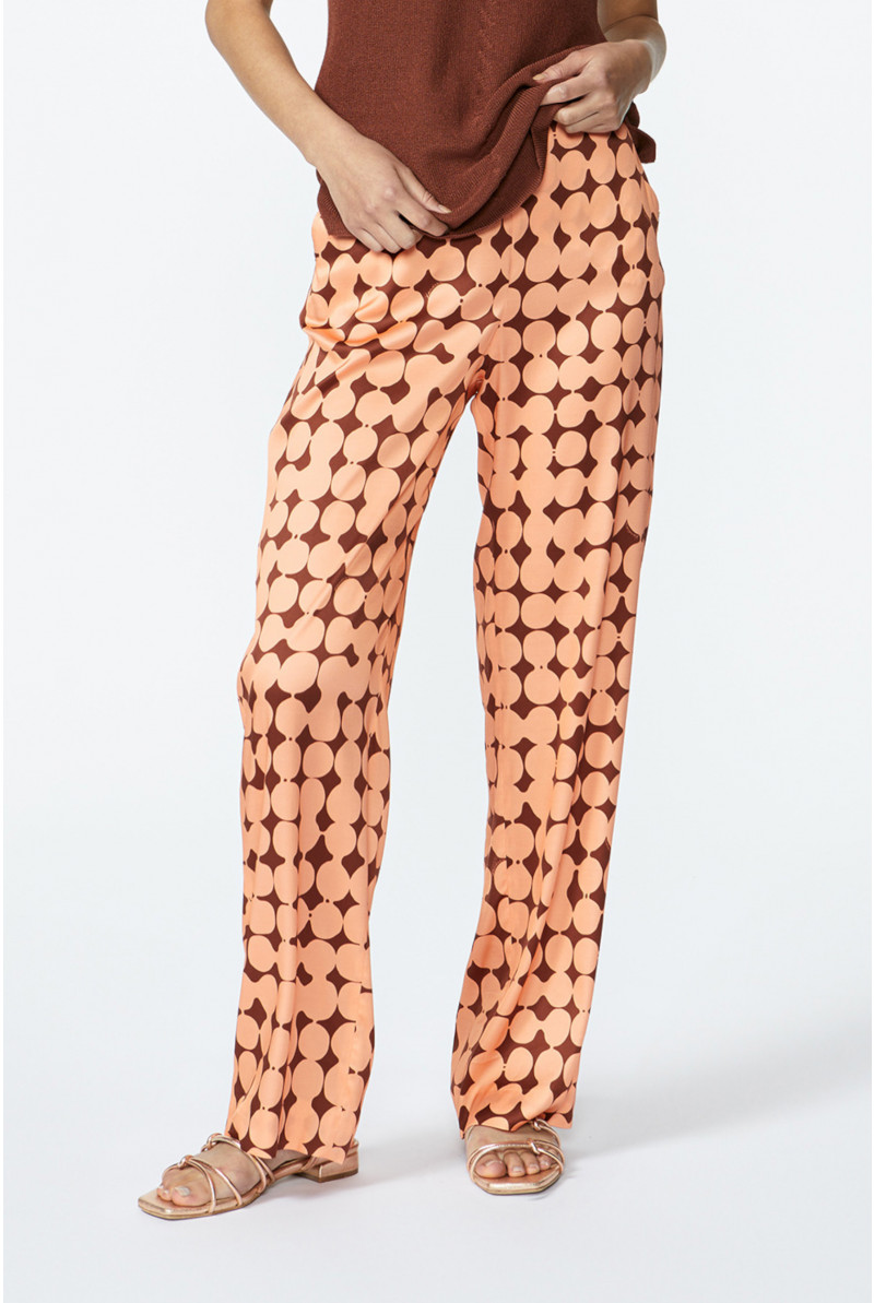 Trousers with in-house dot print