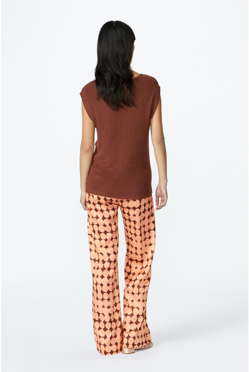 Trousers with in-house dot print